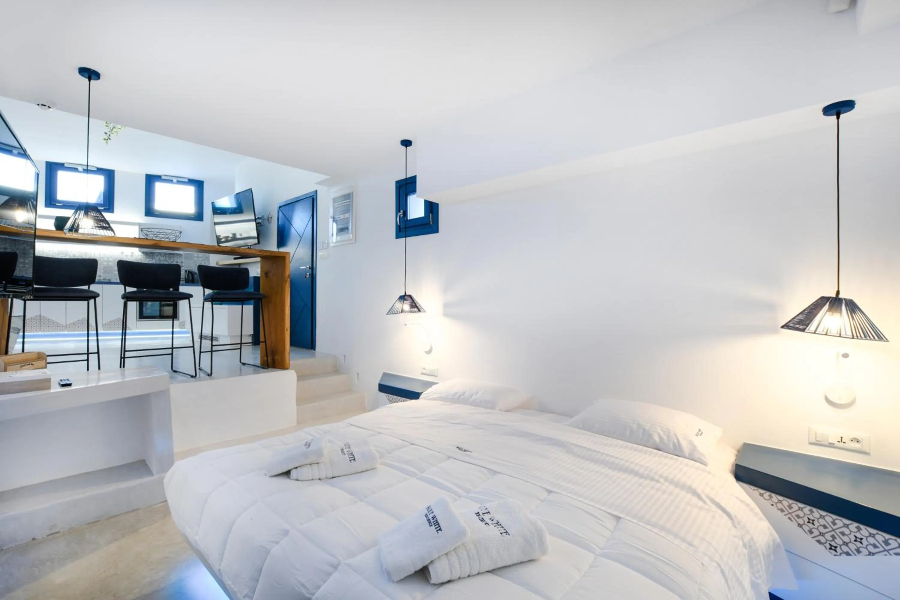 Bed in Blue White Residence