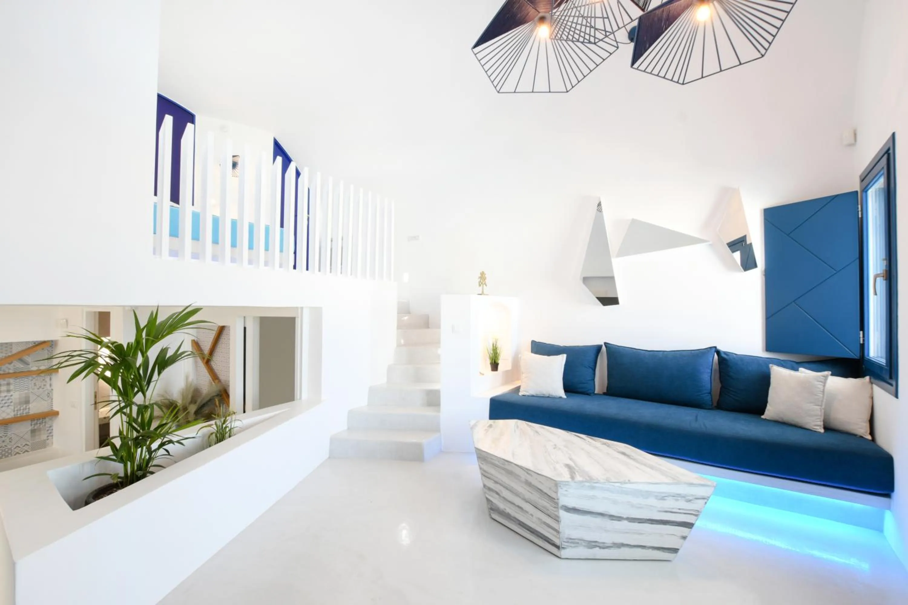 Living room, Bed in Blue White Residence