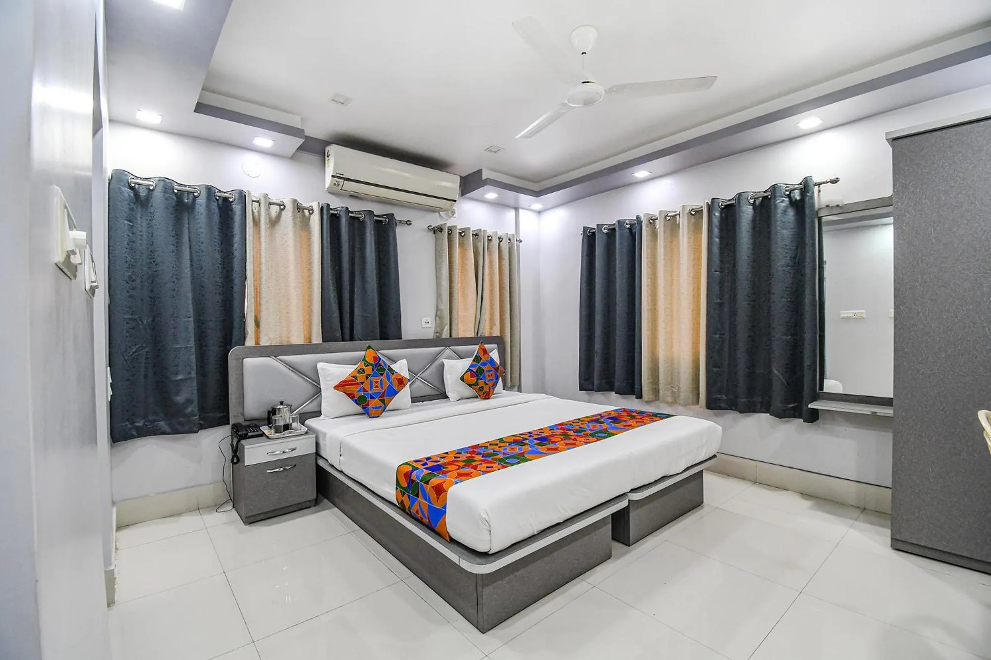 Bed in FabHotel New Annapurna Plaza - Nr Axis Mall