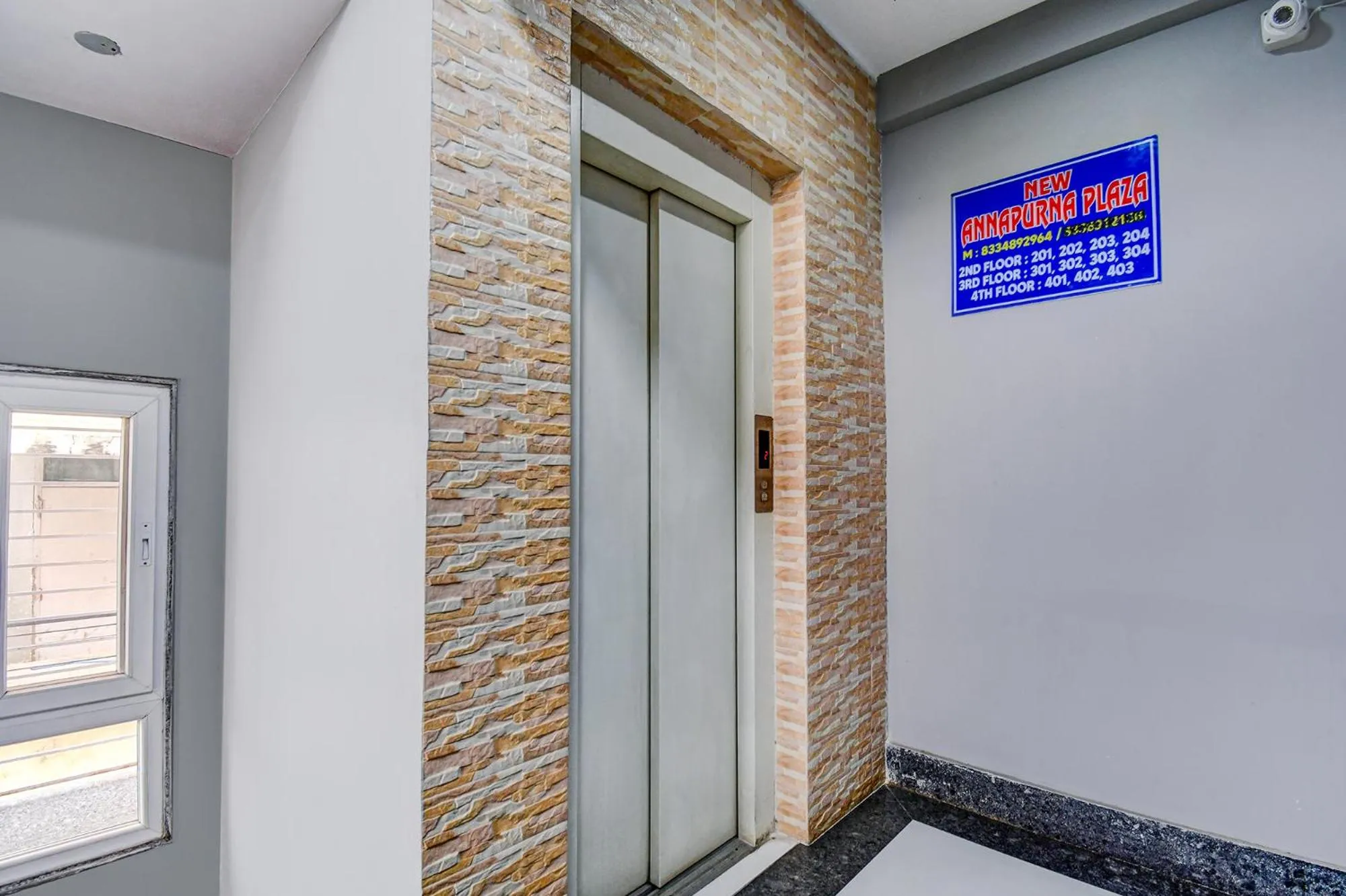 elevator in FabHotel New Annapurna Plaza - Nr Axis Mall