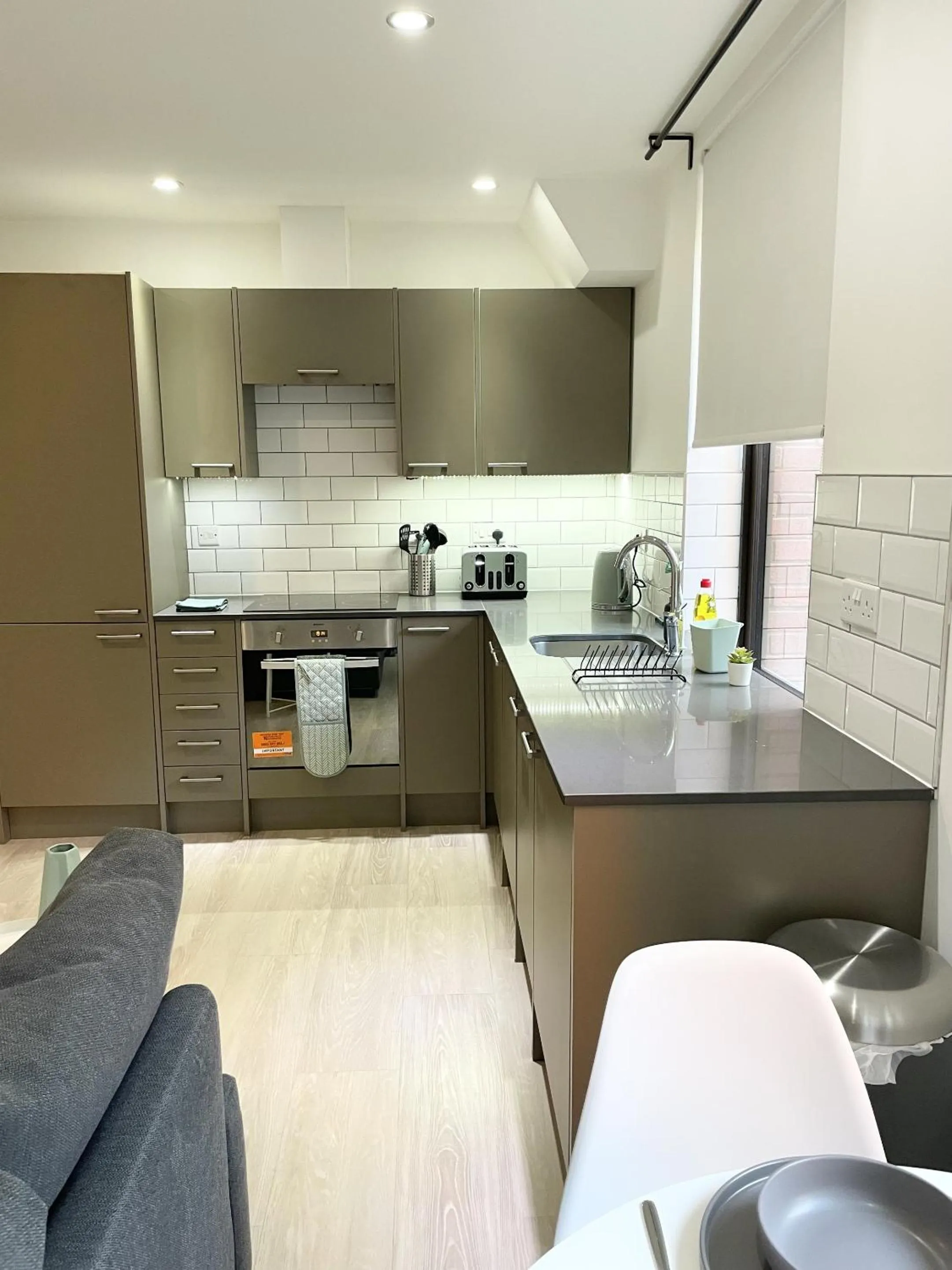 Kitchen or kitchenette in Southernhay Court Apartments by Staytor Accommodation