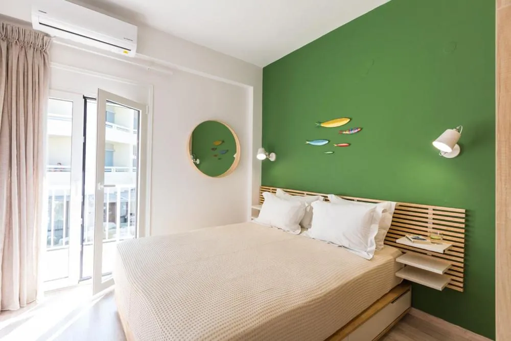 Bed in Anemi Green Cozy apartment, beach views and comfort!