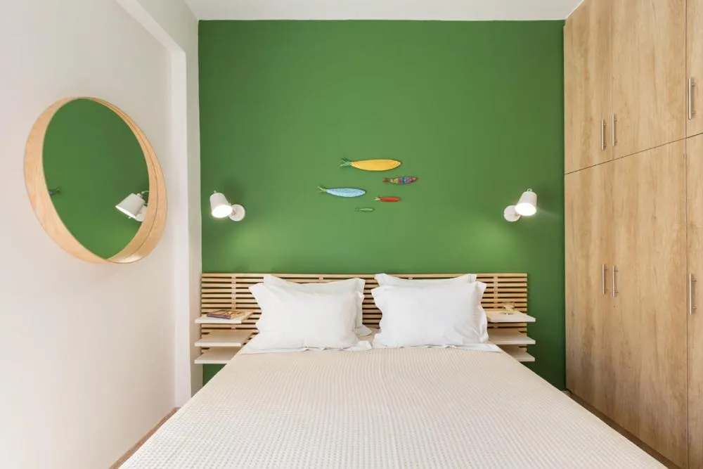 Bed in Anemi Green Cozy apartment, beach views and comfort!