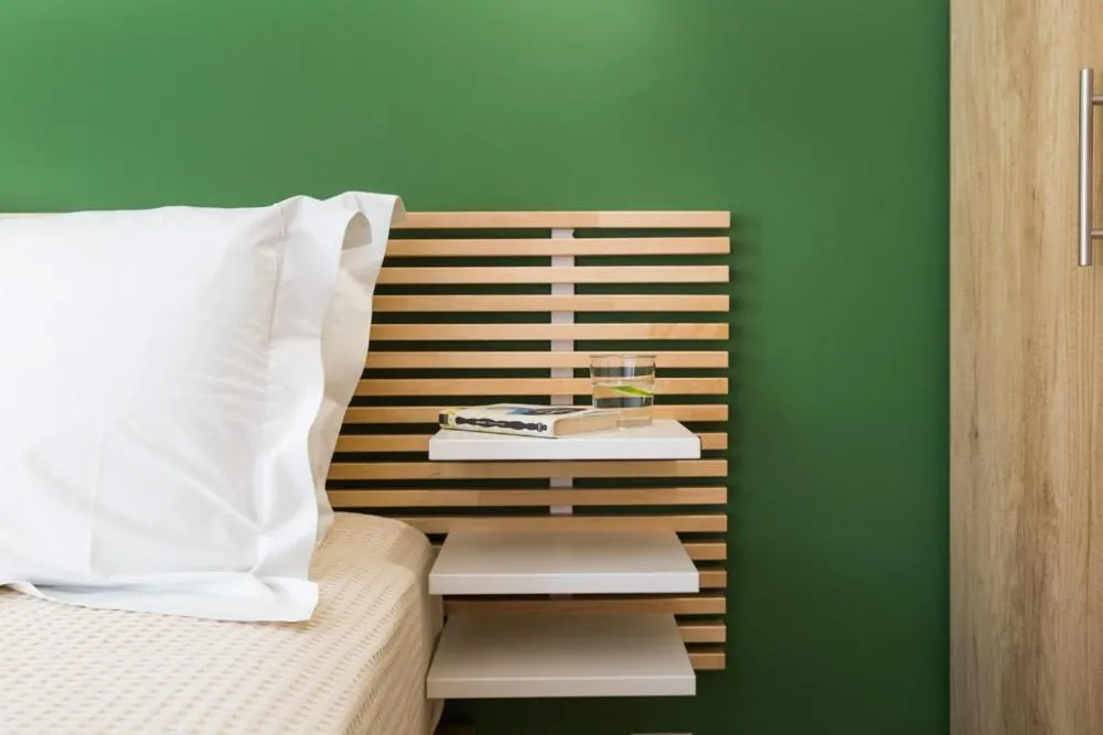 Bed in Anemi Green Cozy apartment, beach views and comfort!