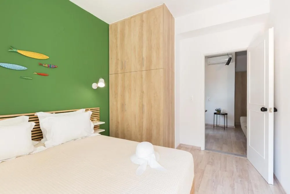 Bed in Anemi Green Cozy apartment, beach views and comfort!