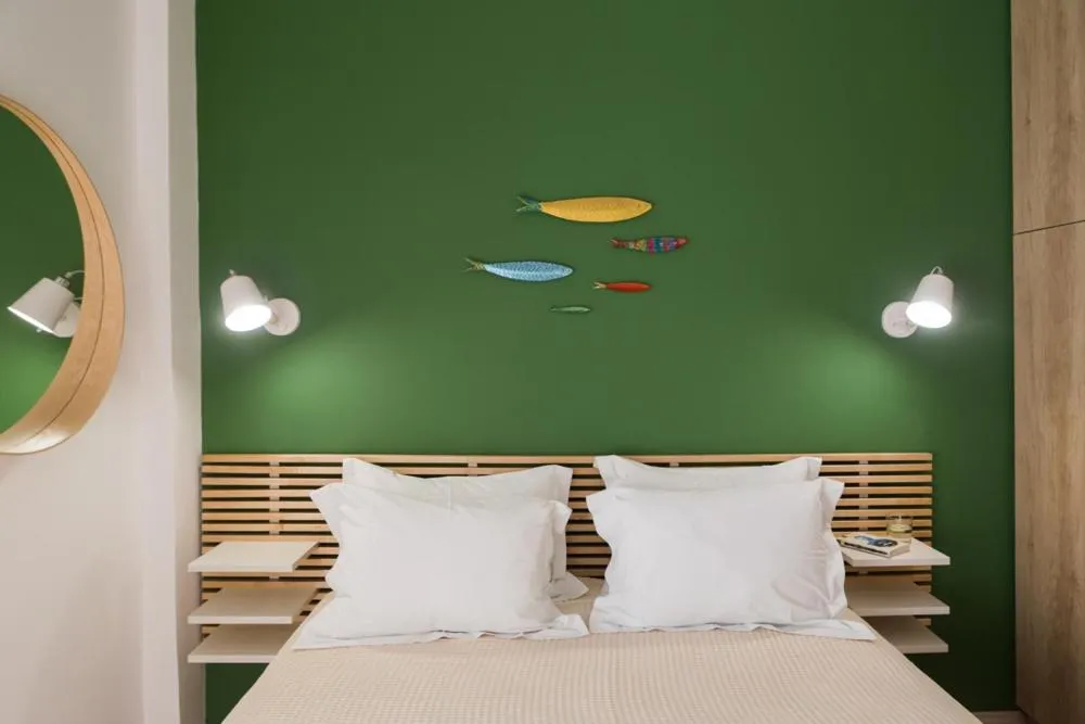 Bed in Anemi Green Cozy apartment, beach views and comfort!