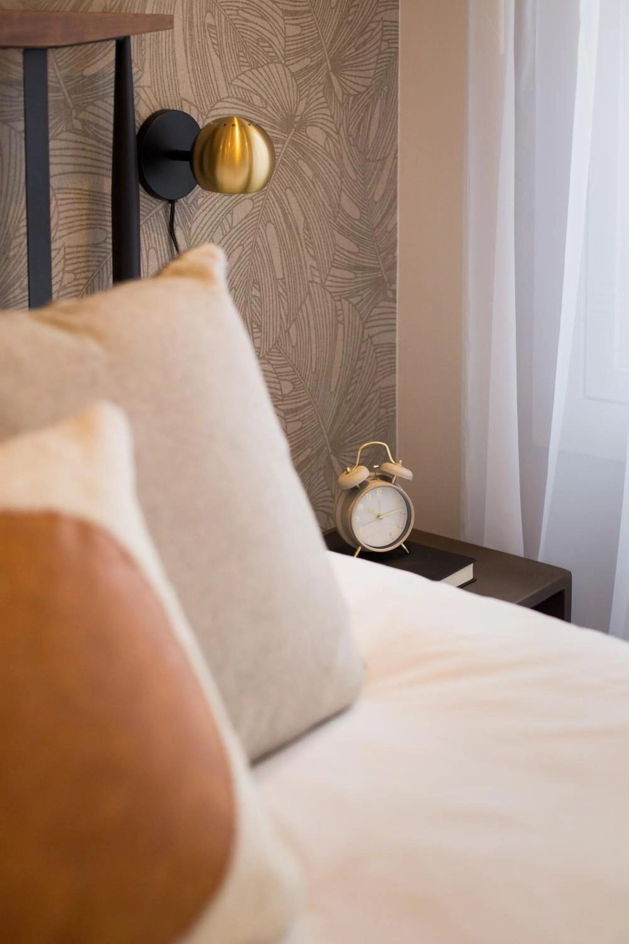 Bed in Blue Tropics Studio in Little Italy with kitchen by Den Stays