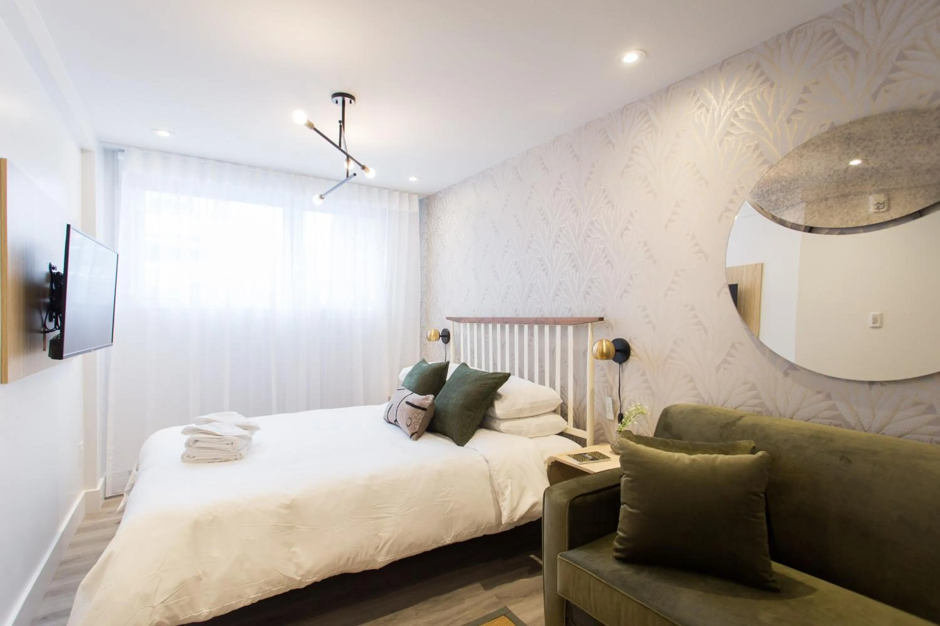 Bed in 16 Studio Apartment-Hotel in Little Italy by Den Stays