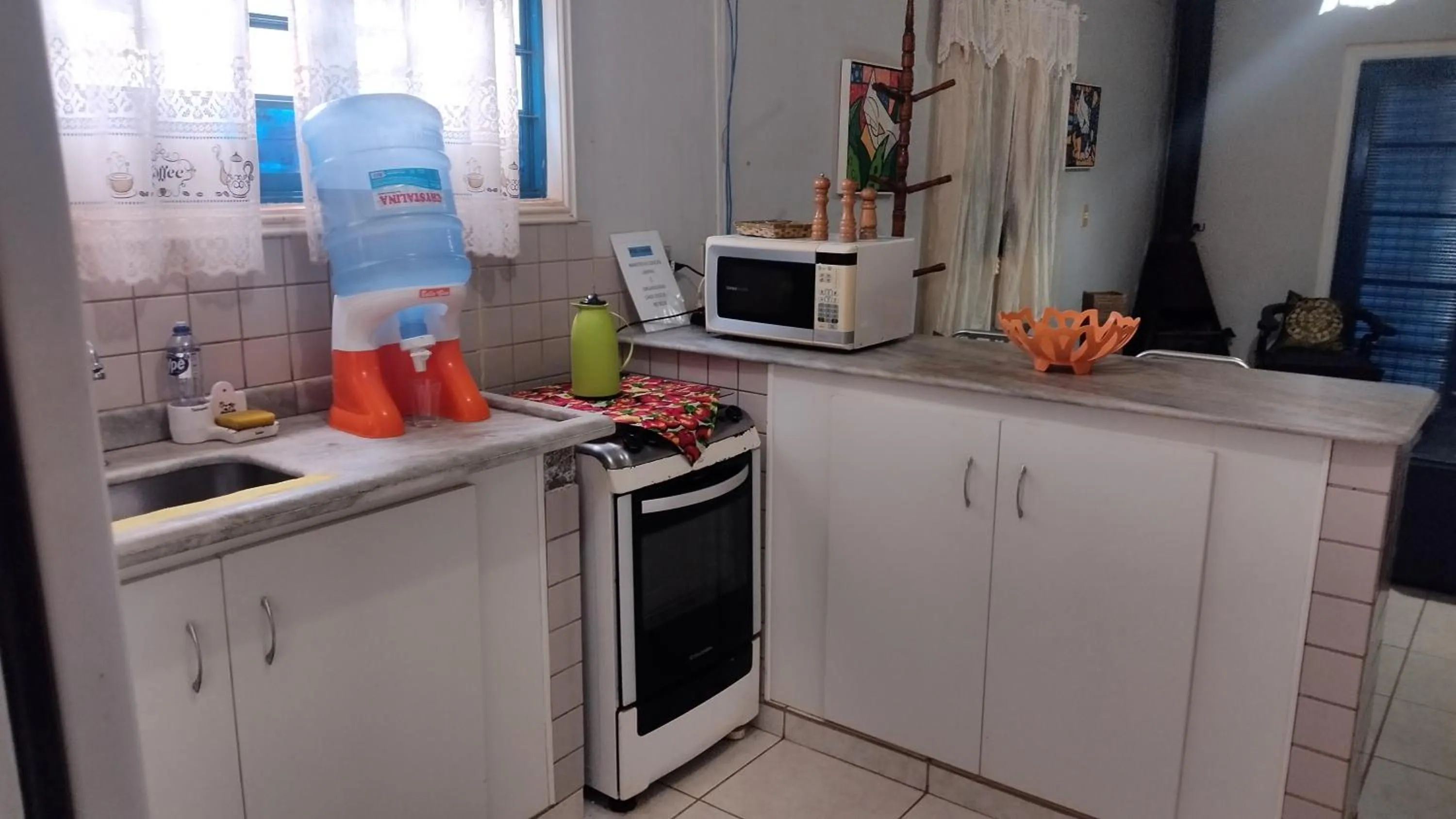 Kitchen or kitchenette in Pousada Canto dos Passaros