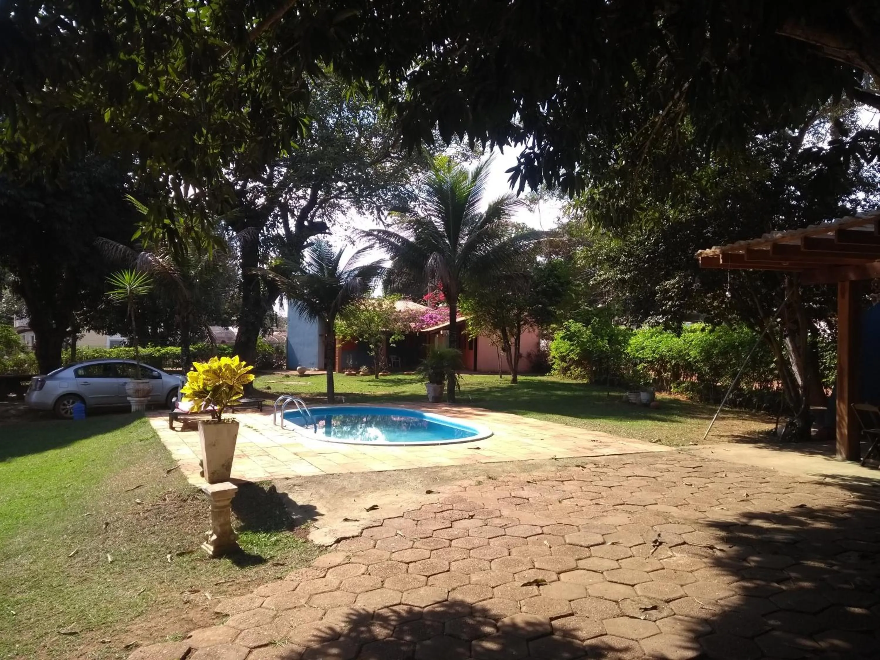 Swimming pool in Pousada Canto dos Passaros