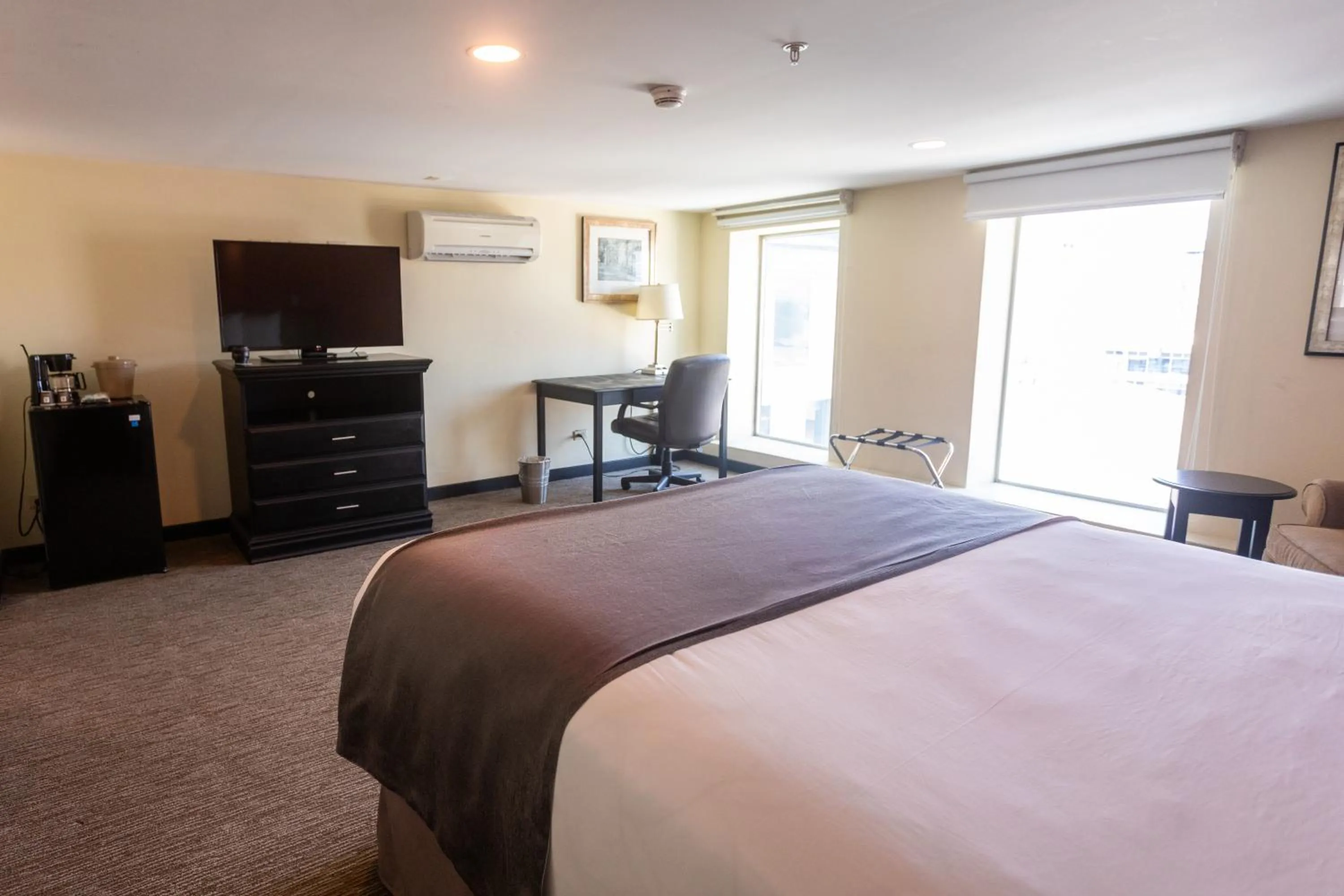 Bed in Urban Green Hotel & Suites