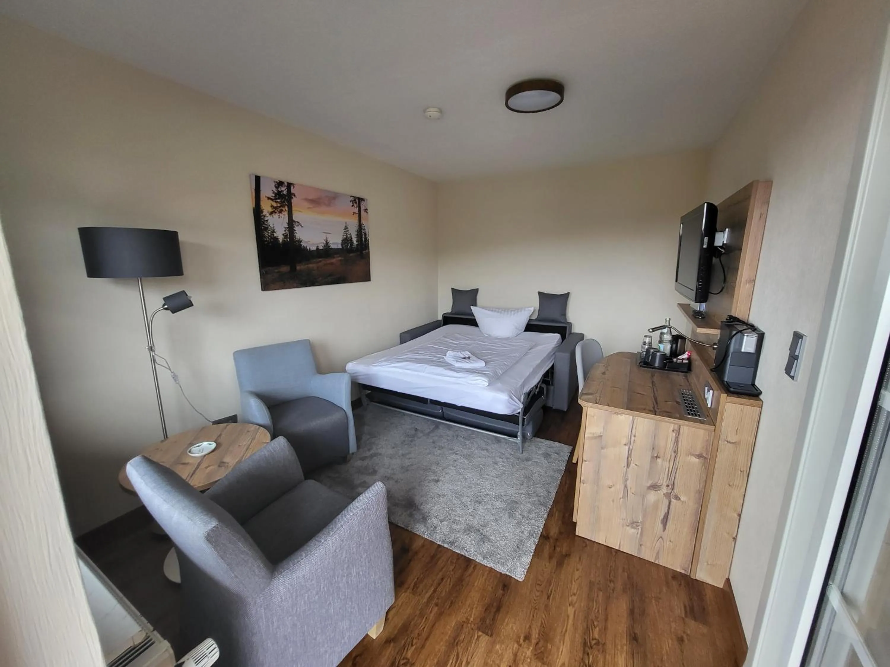 Living room, Bed in Hotel Waldrausch