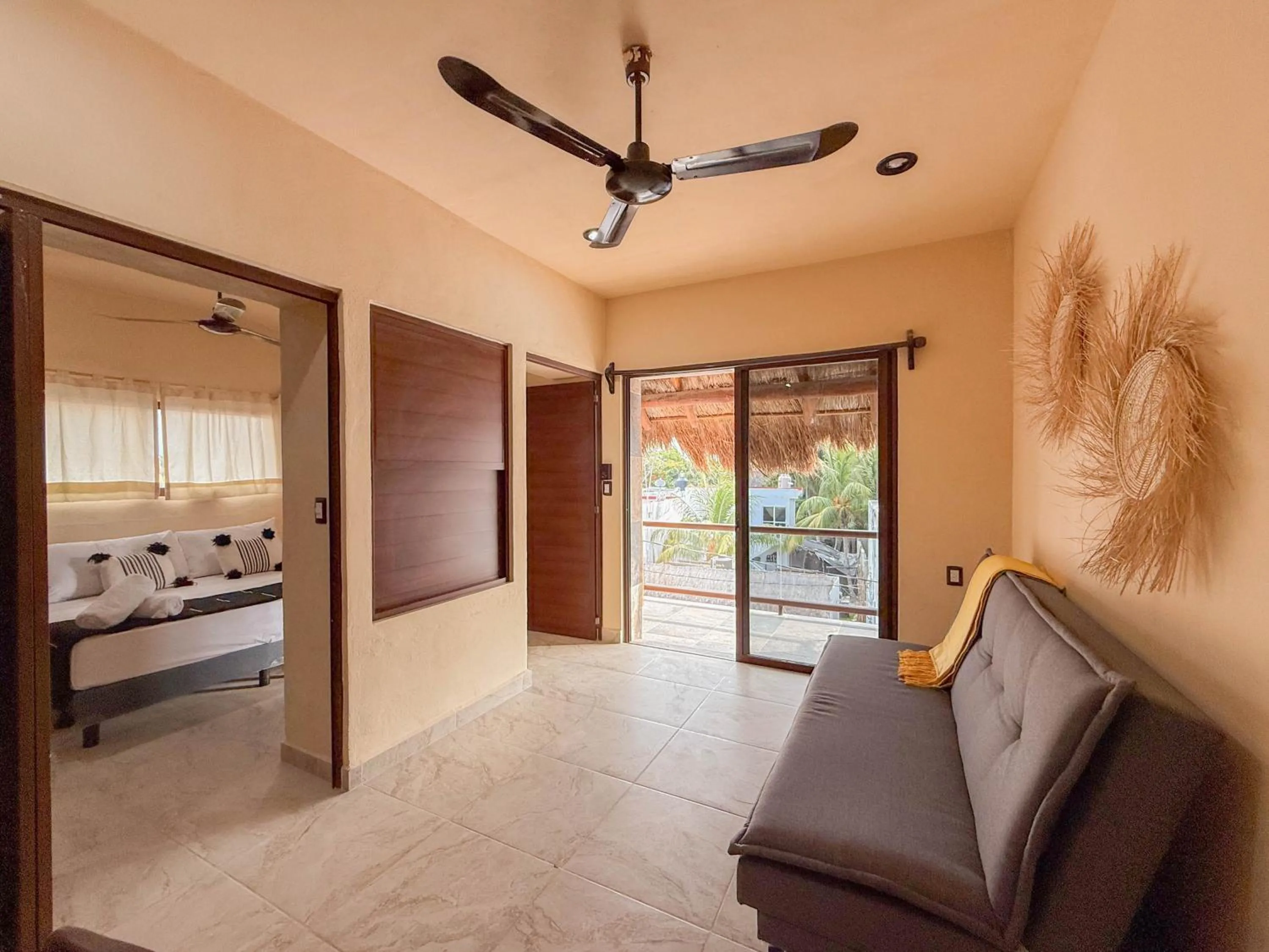 Seating area, Bed in Hotel Macondo Holbox