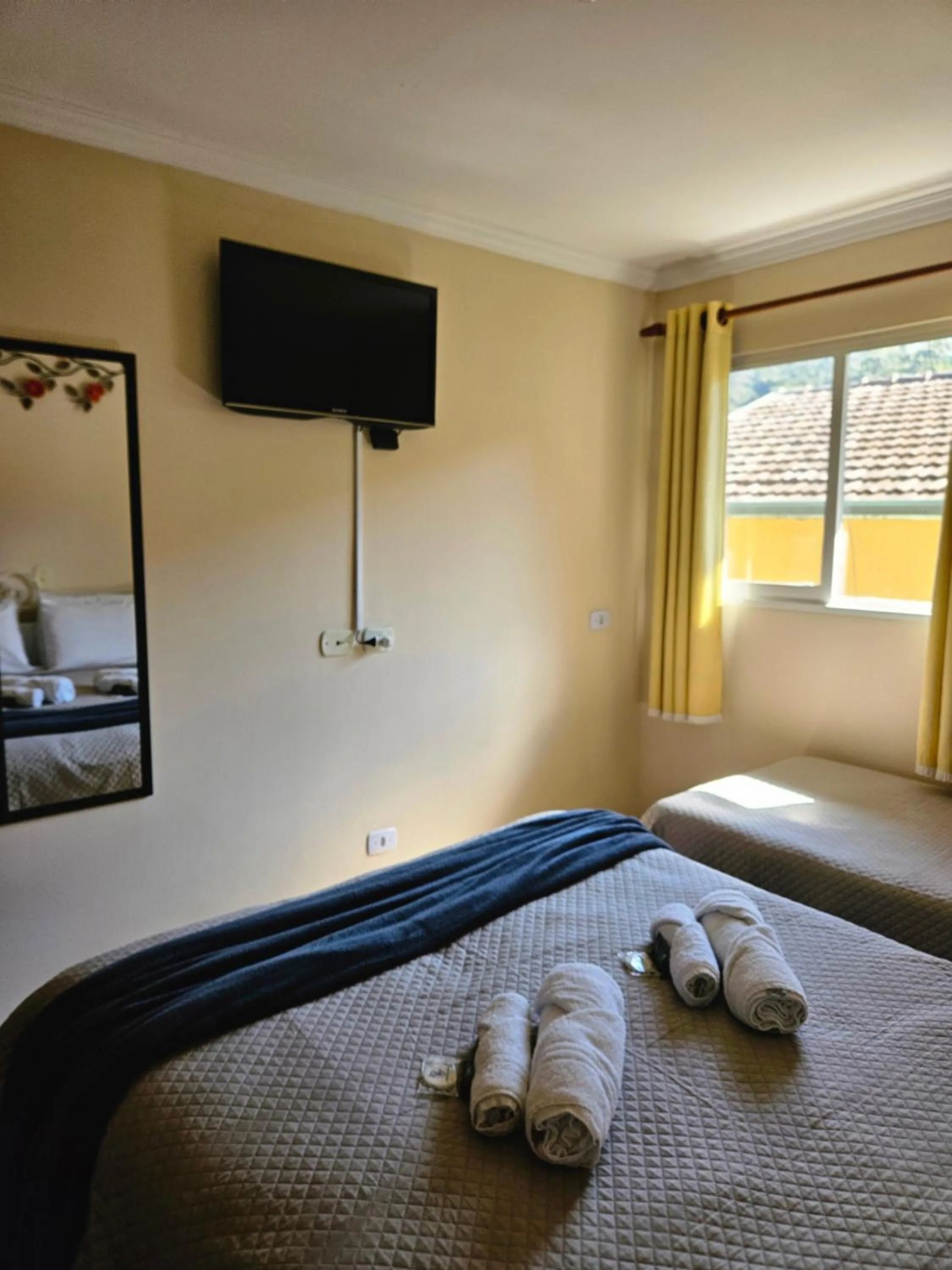 Bed in Pousada Araucária