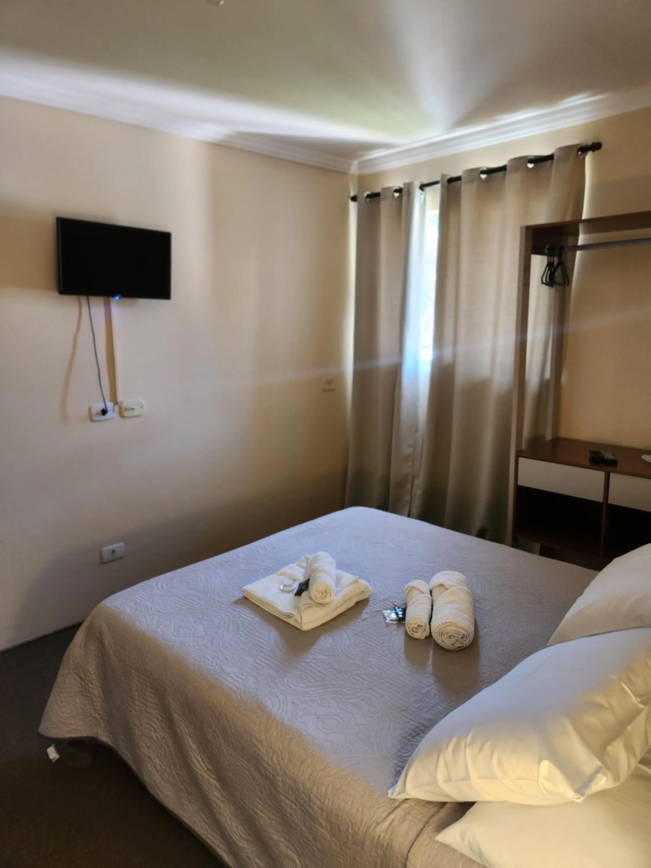 Bed in Pousada Araucária