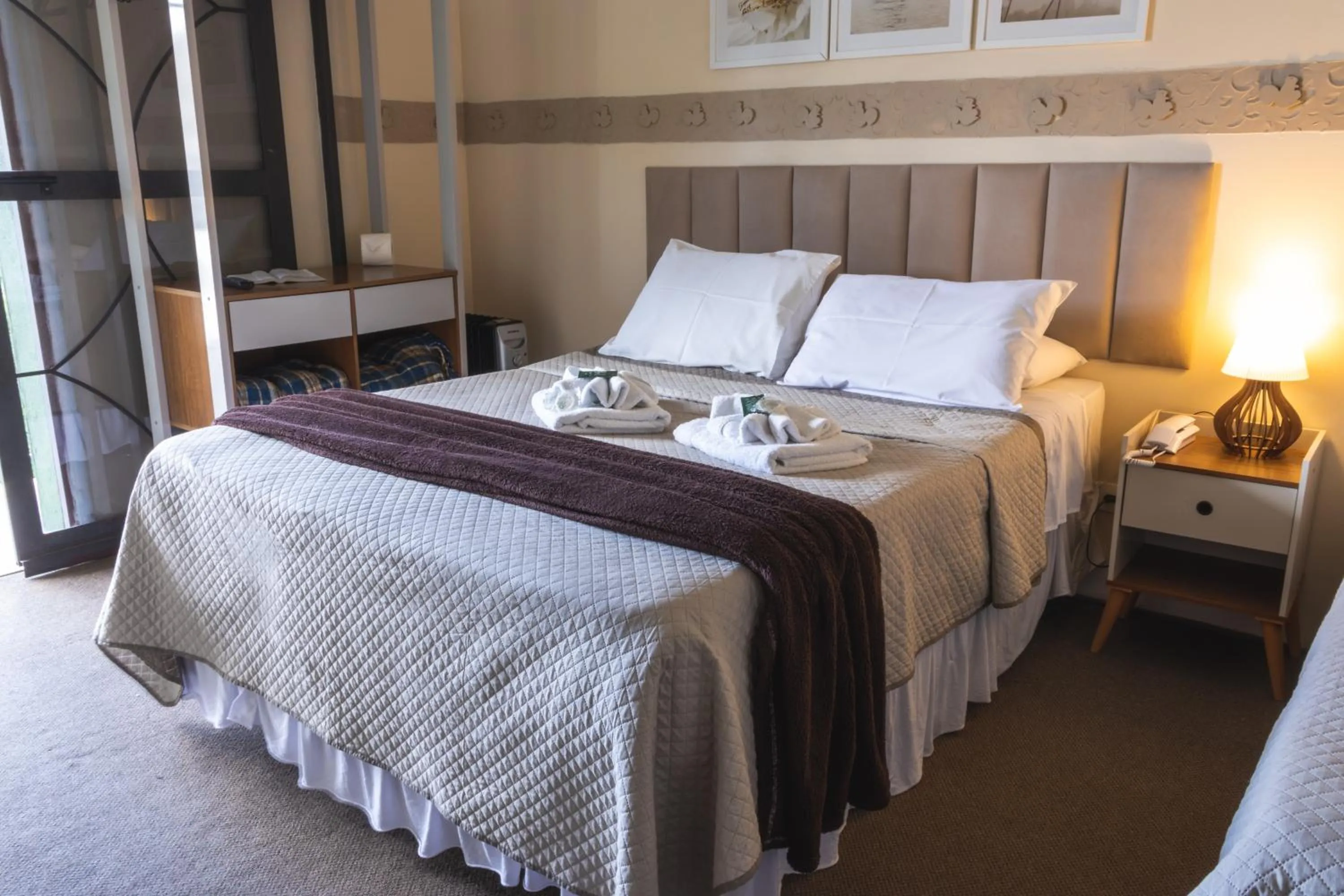 Bed in Pousada Araucária