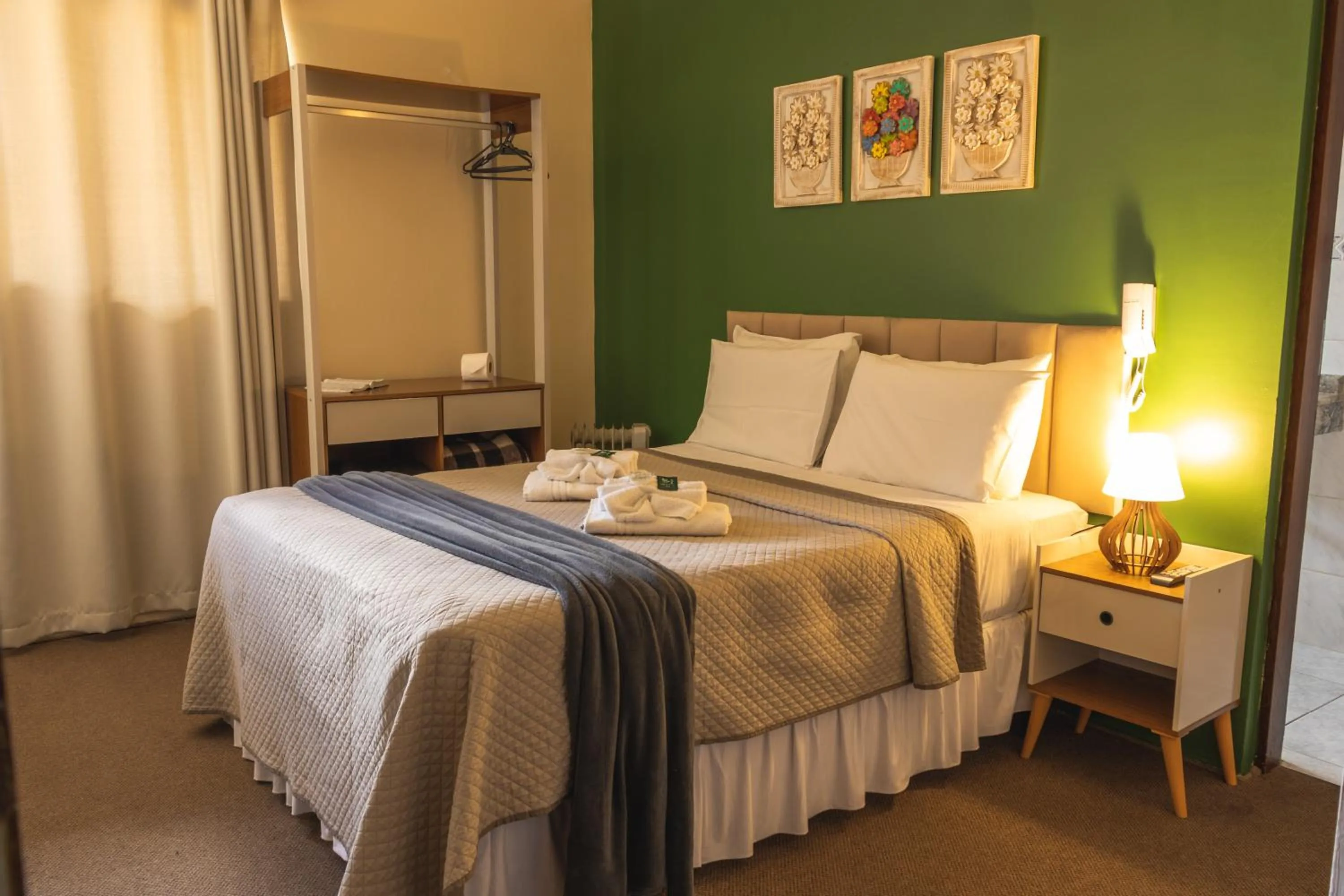 Bed in Pousada Araucária