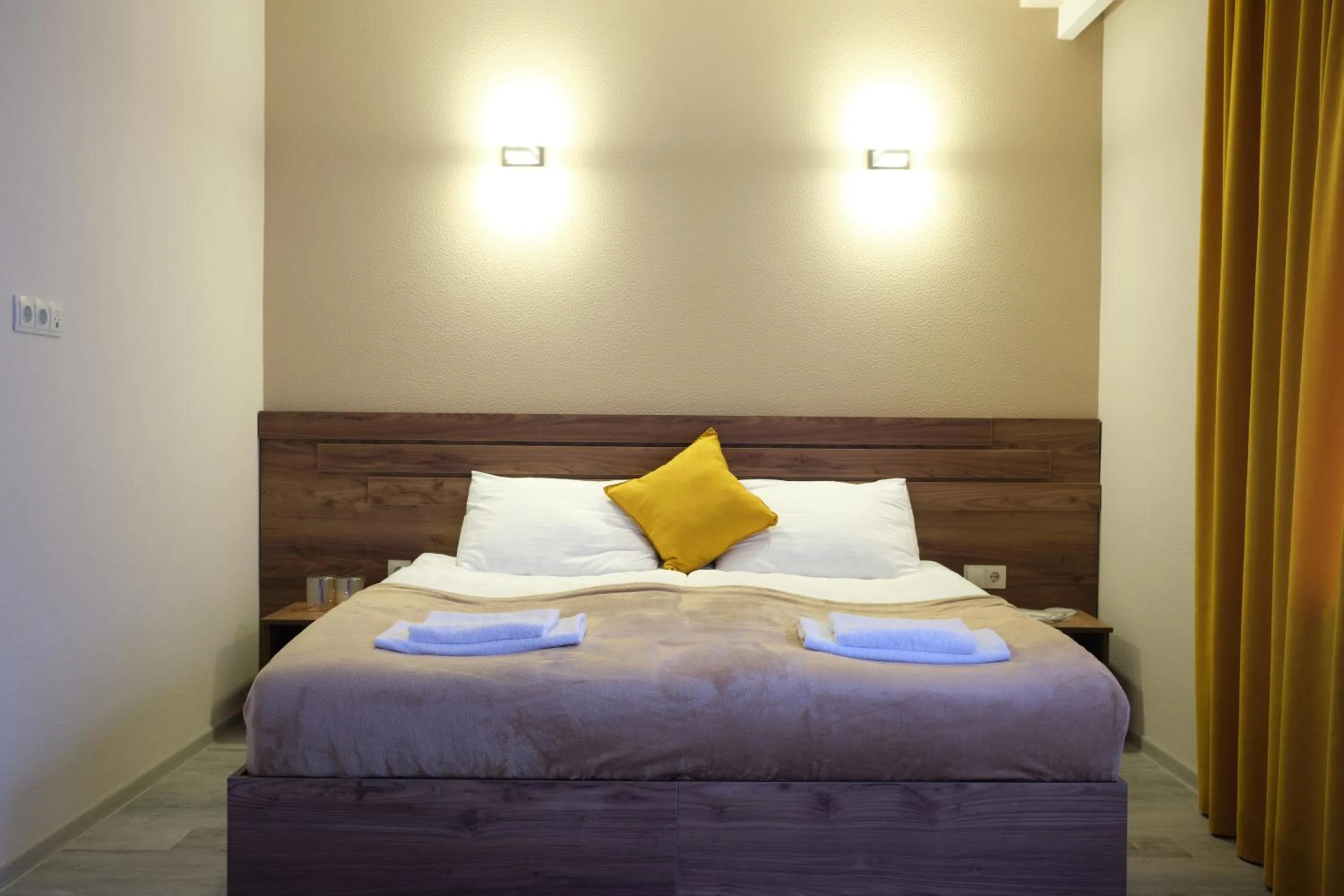 Bed in Hotel Axien Kazbegi