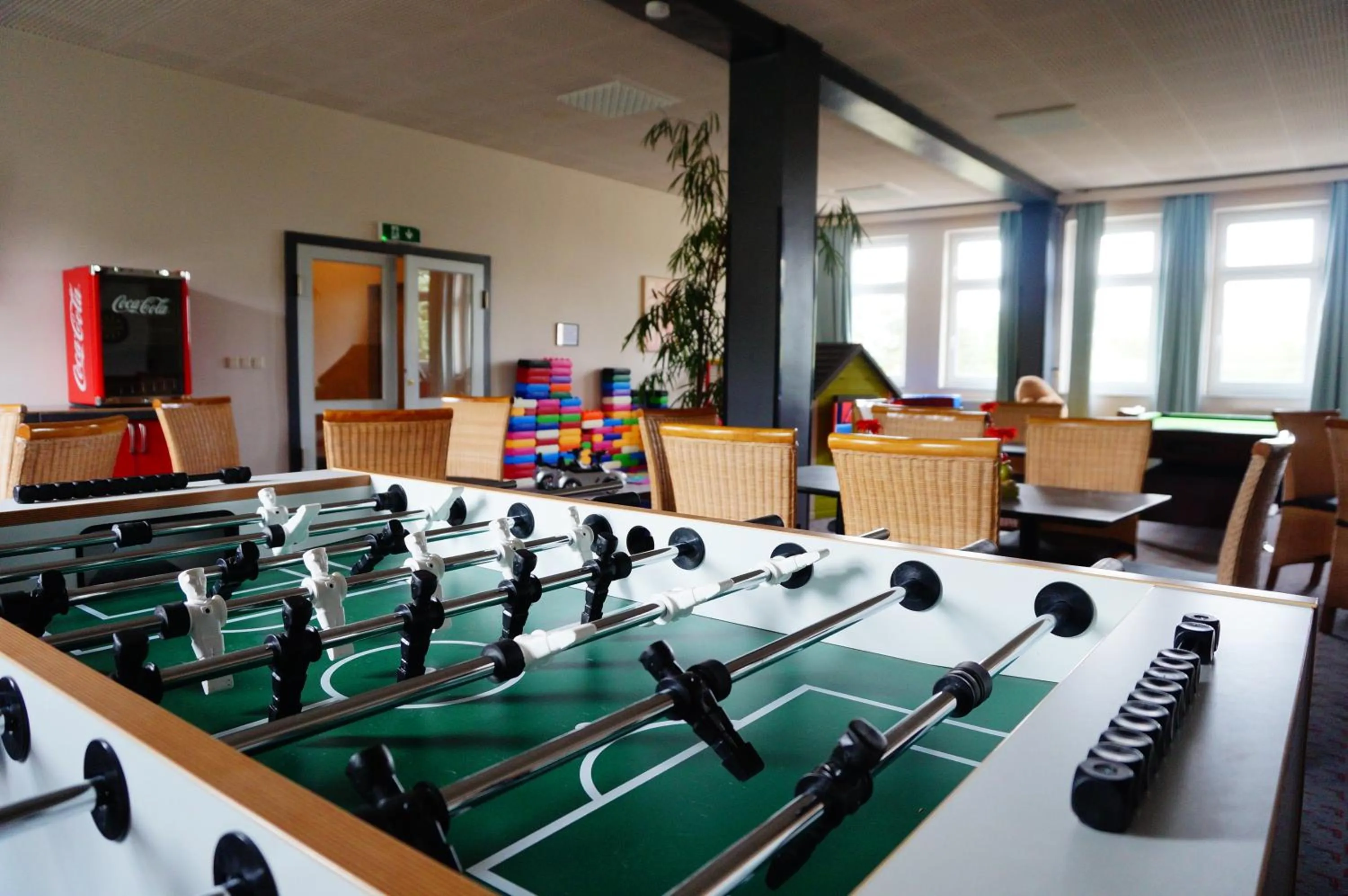 Communal lounge/ TV room in Hotel am Tierpark