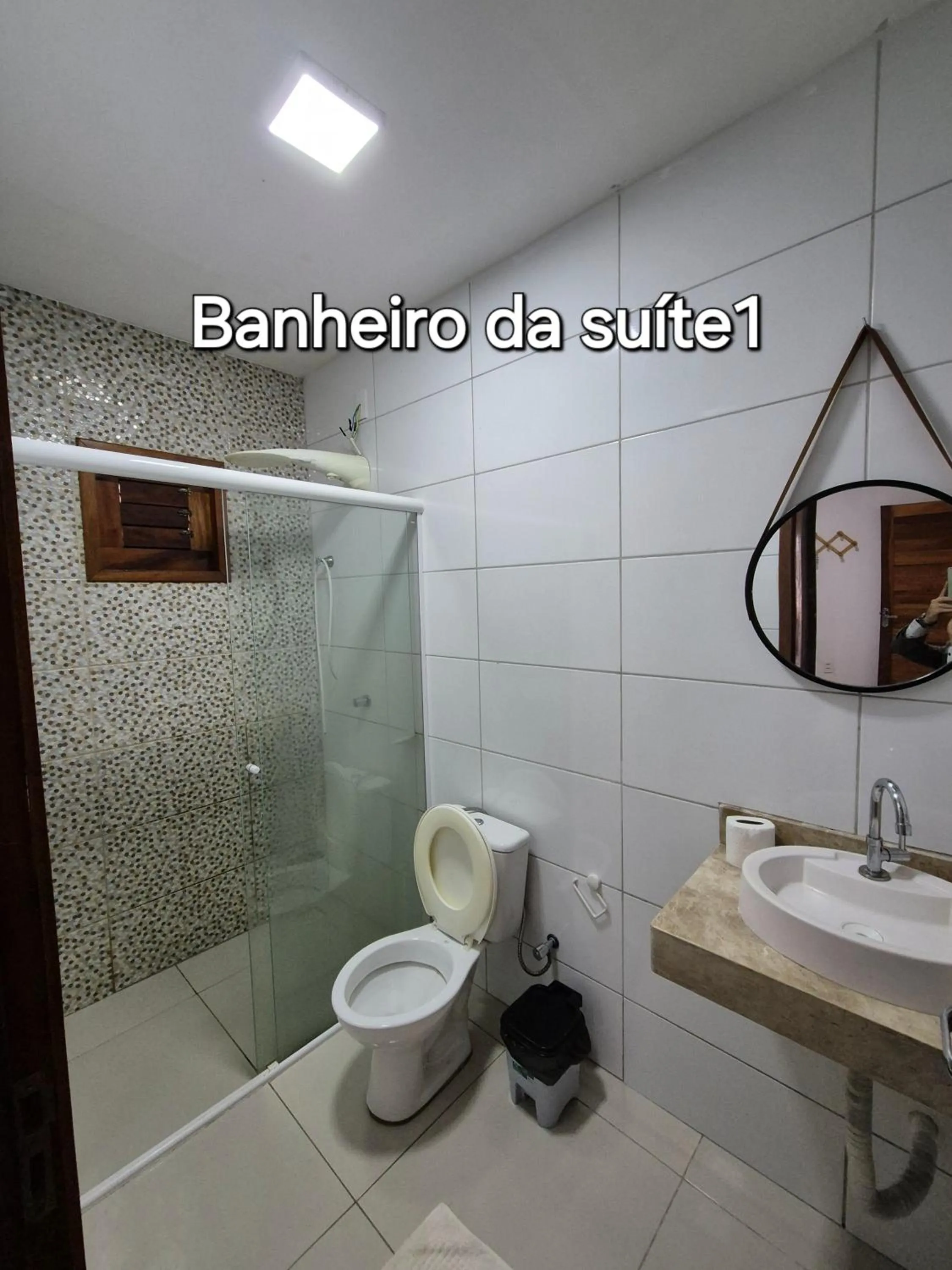 Bathroom in Casa na praia com vista para o mar
