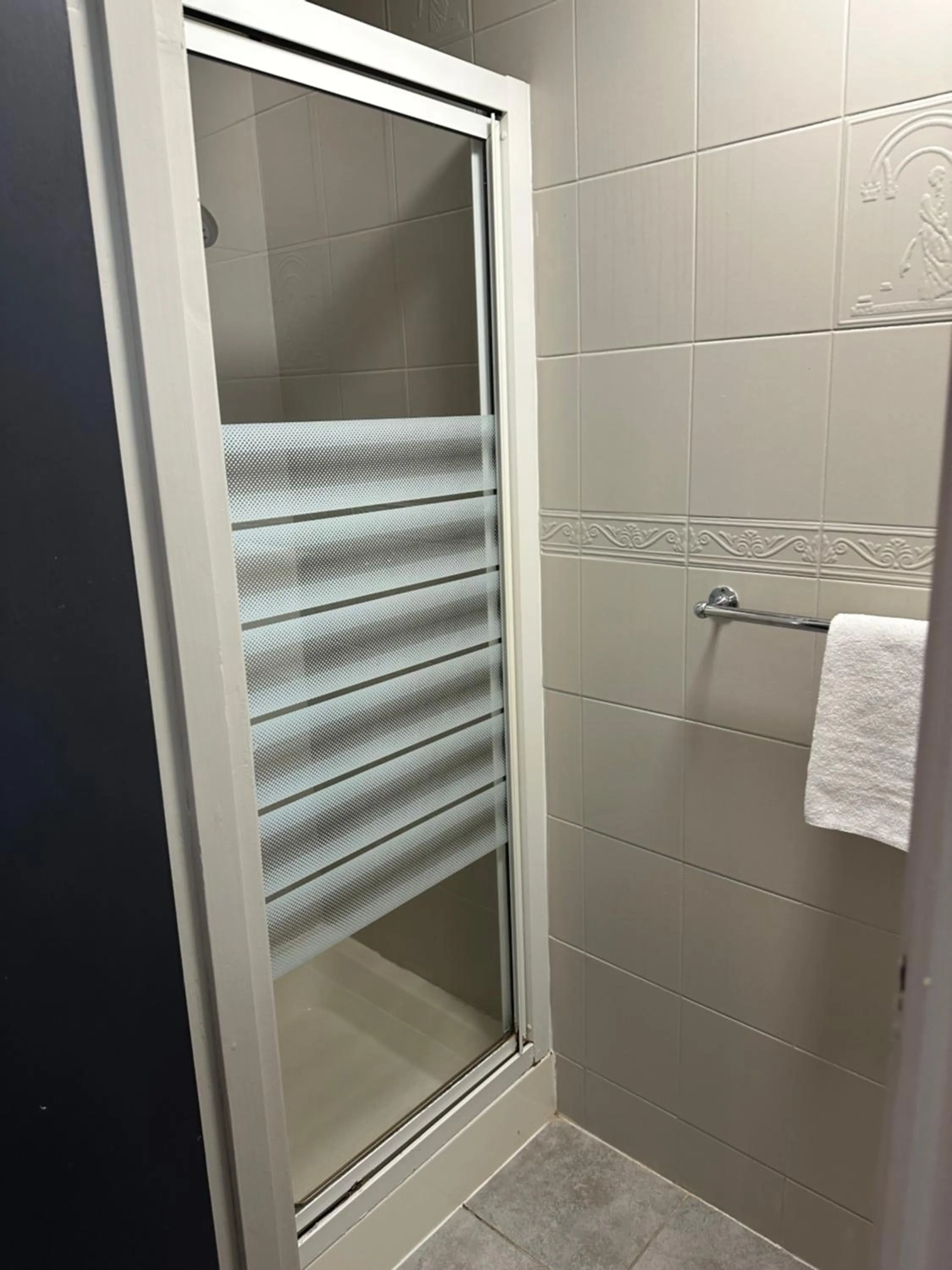 Shower in The Q Hotel