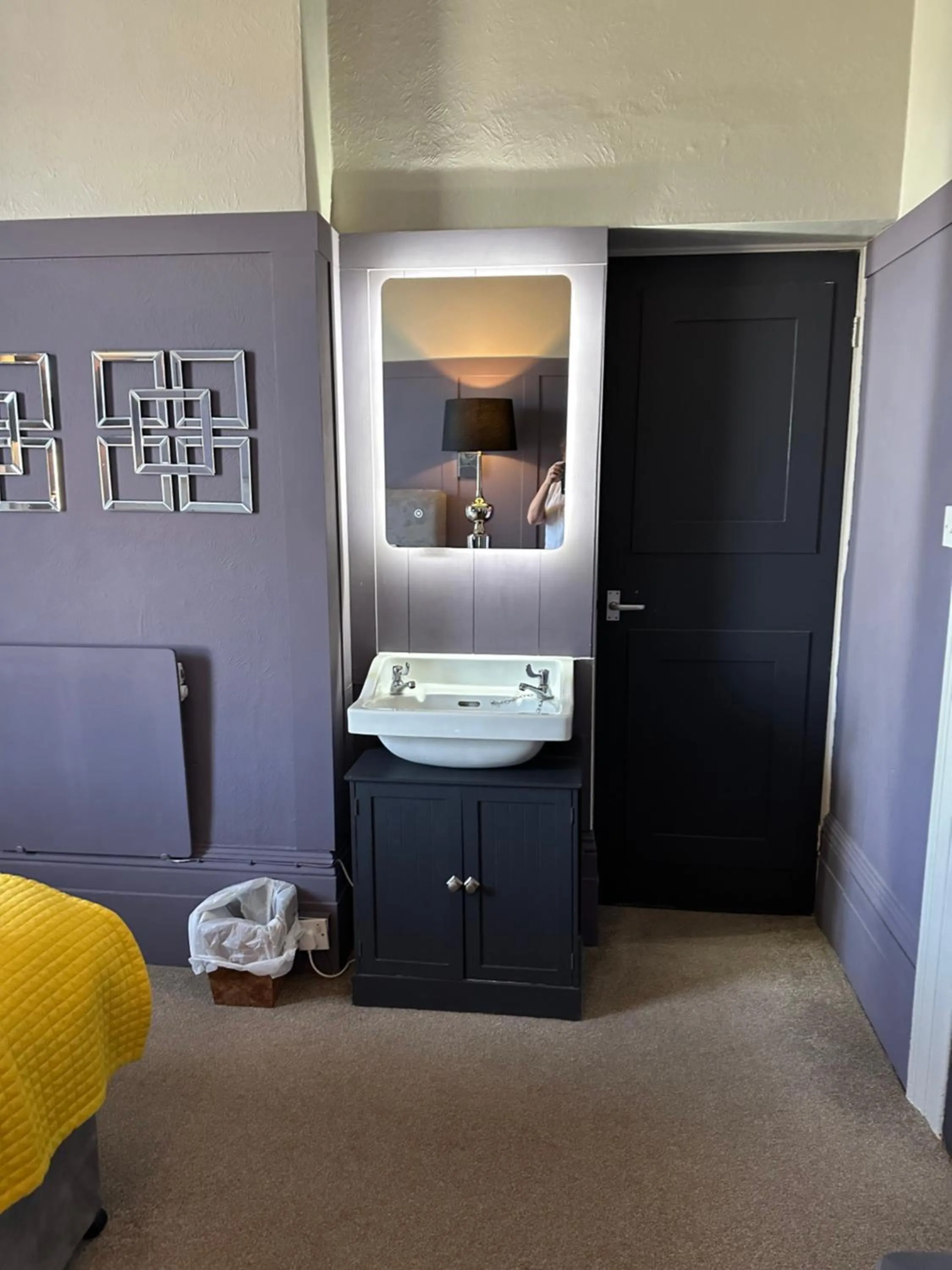 Bedroom in The Q Hotel