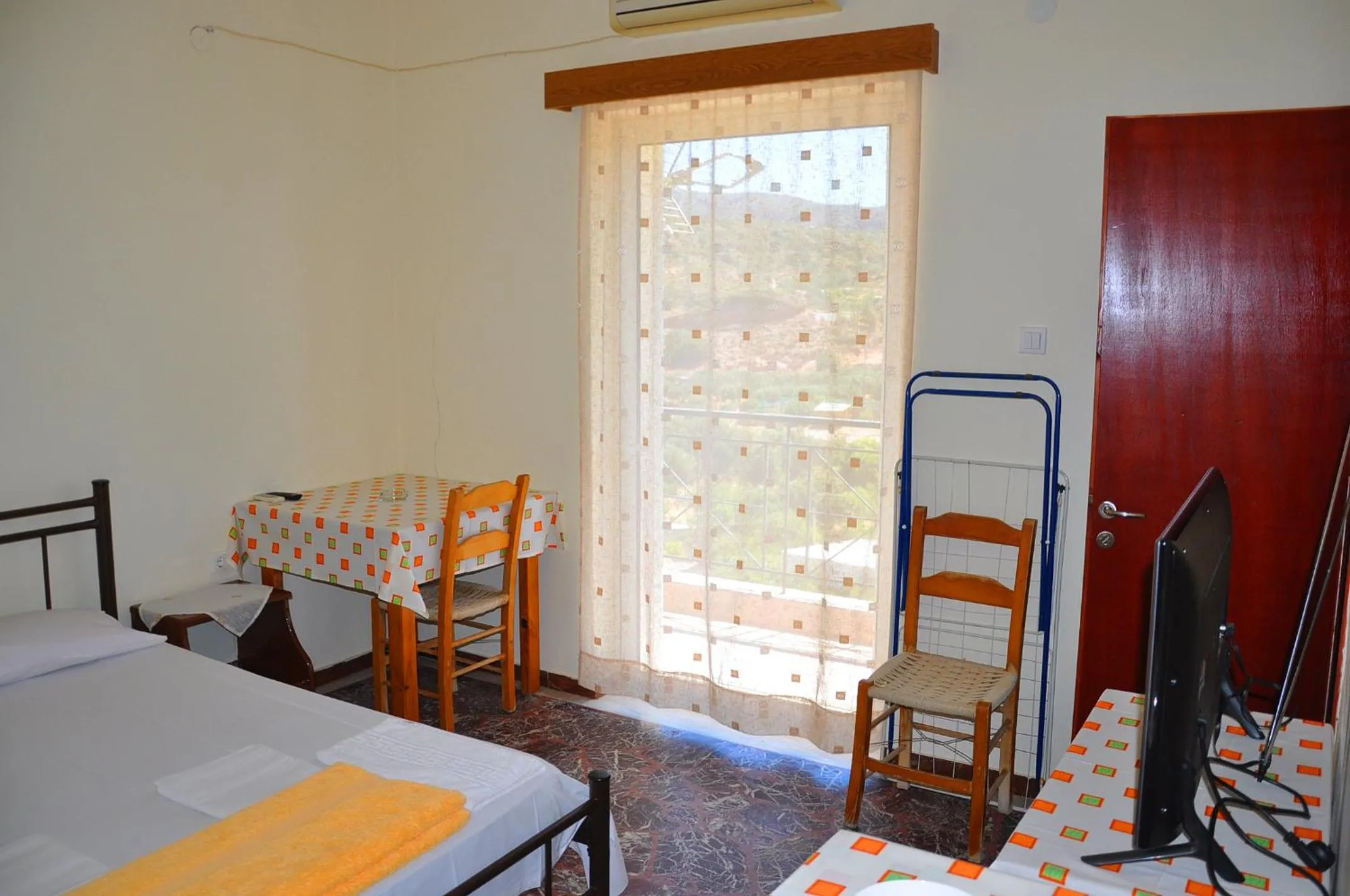 Bed in Vai Rent Rooms