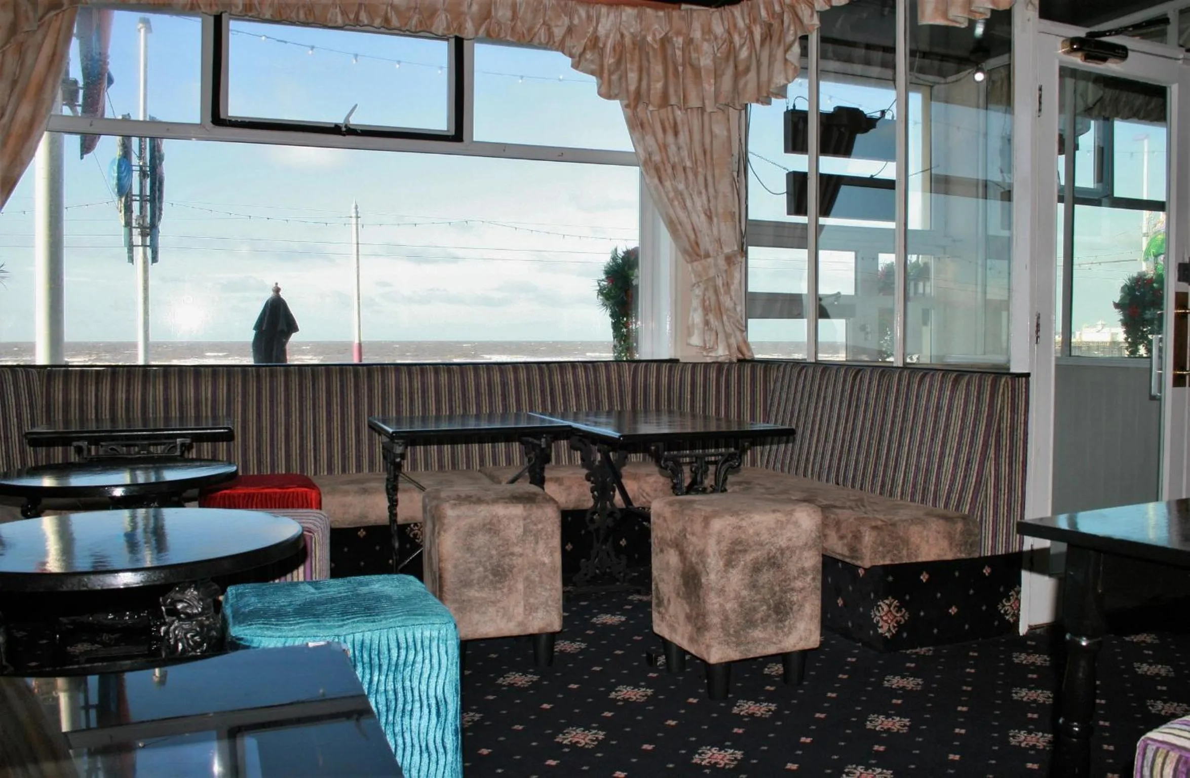 Communal lounge/ TV room in The Blenheim Mount Hotel