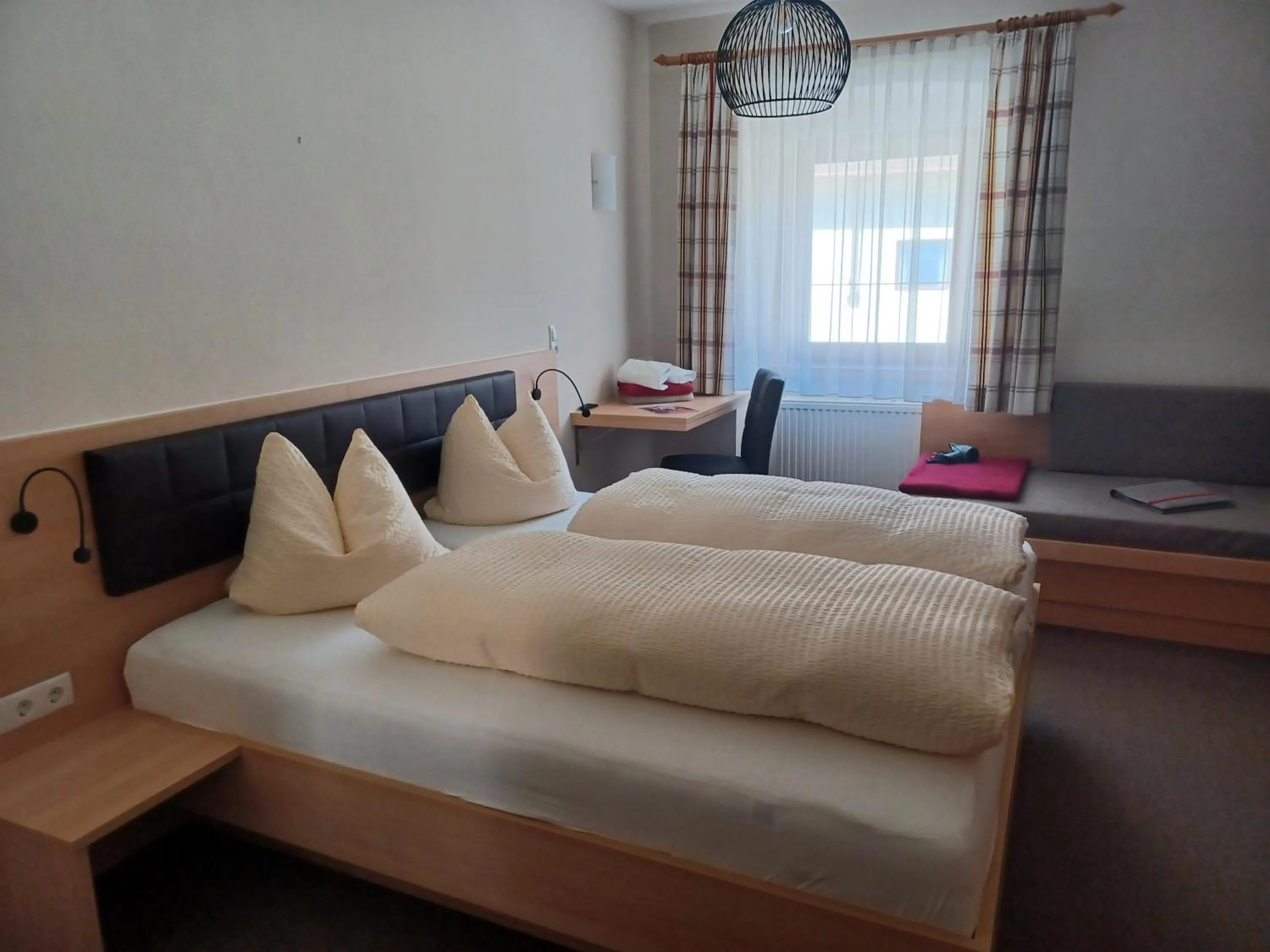 Photo of the whole room, Bed in Hotel Garni Löwen