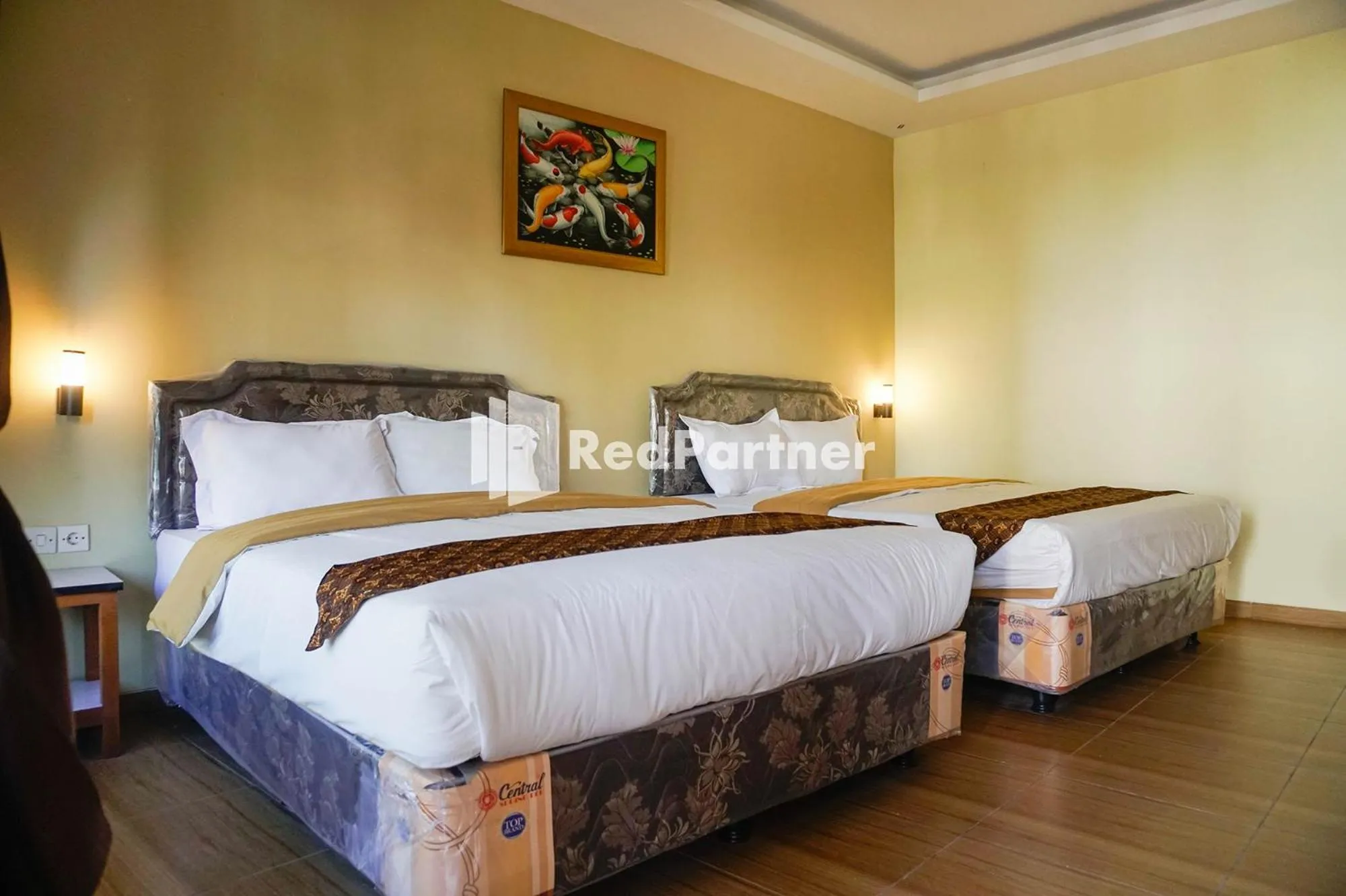 Bed in Griya Imafa Inn RedPartner near Jatim Park 2