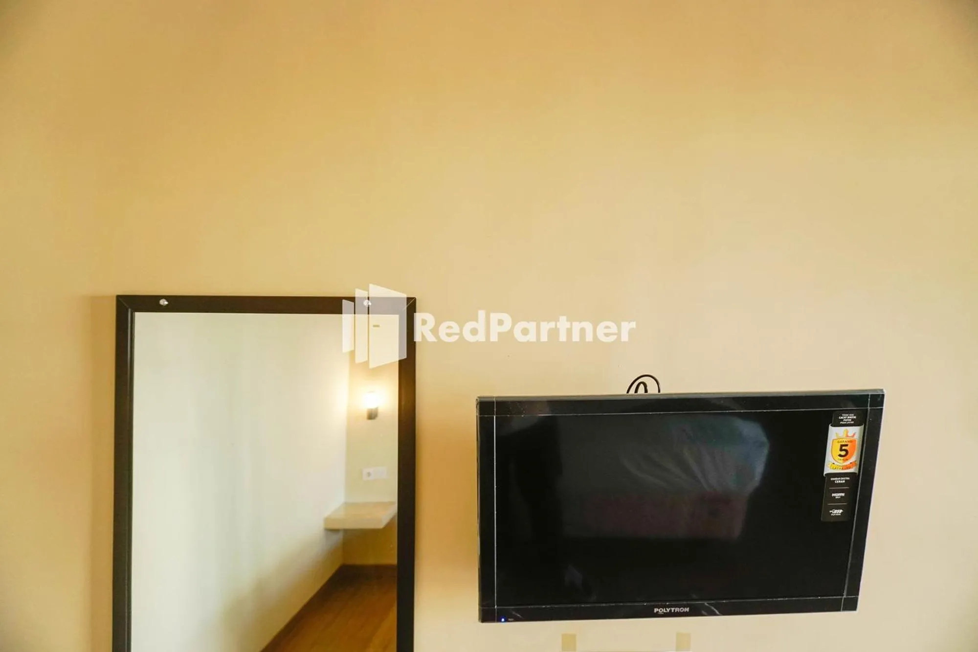 TV and multimedia in Griya Imafa Inn RedPartner near Jatim Park 2