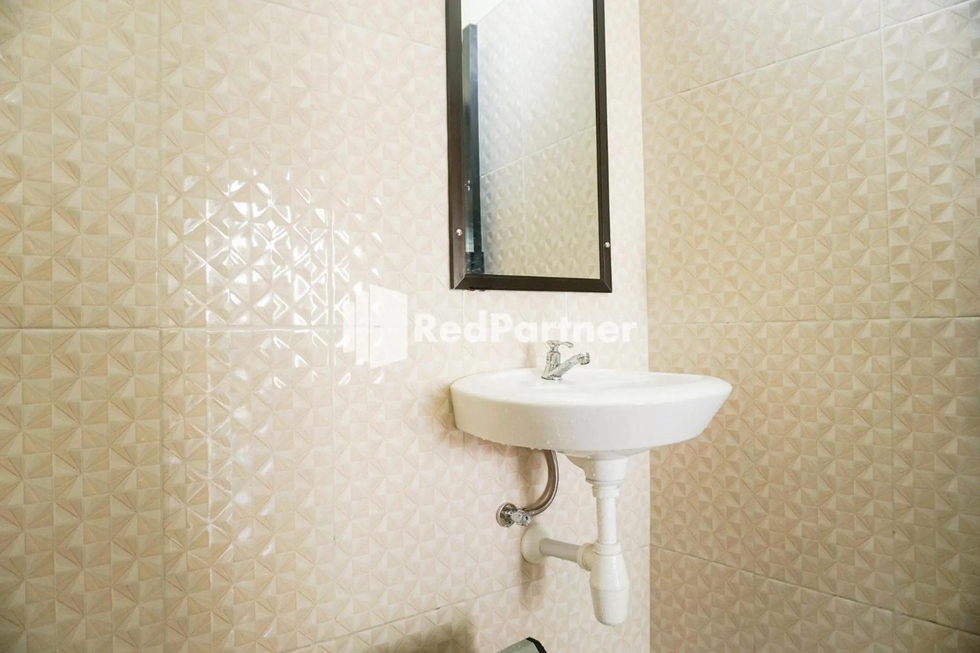 Bathroom in Griya Imafa Inn RedPartner near Jatim Park 2