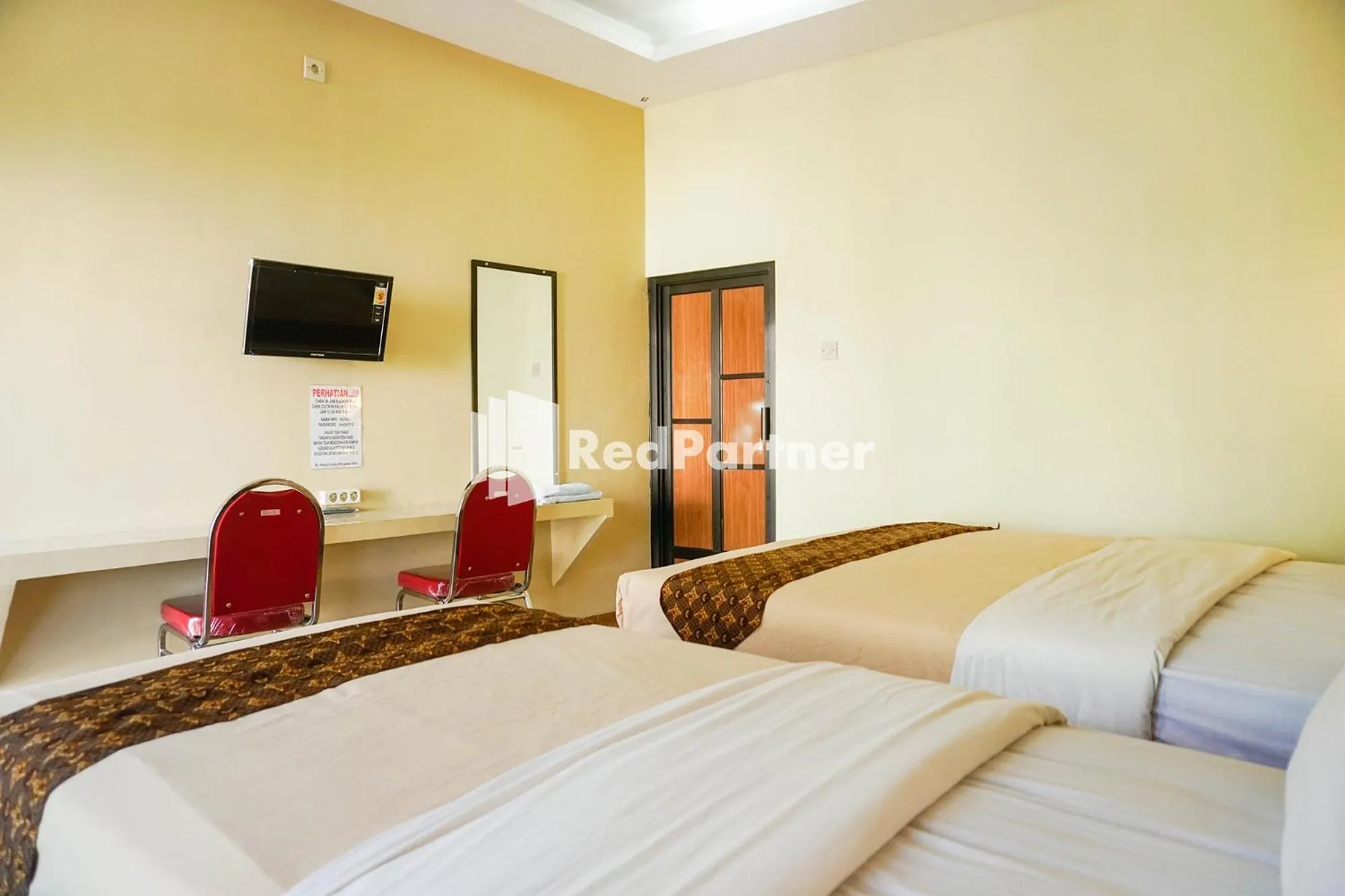 Bed in Griya Imafa Inn RedPartner near Jatim Park 2