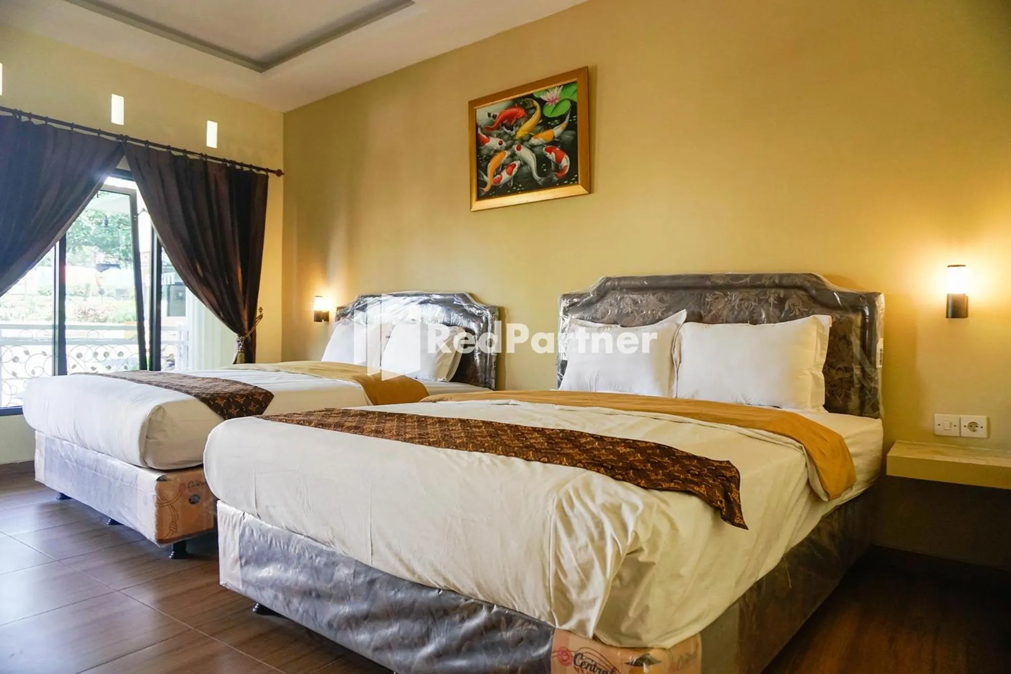 Bed in Griya Imafa Inn RedPartner near Jatim Park 2