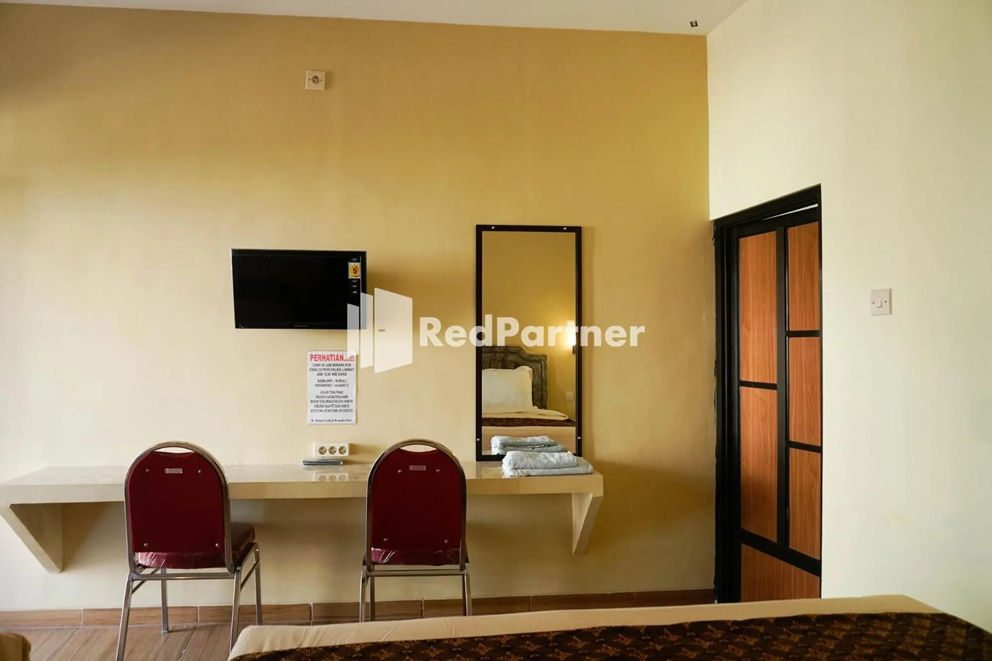 Bed in Griya Imafa Inn RedPartner near Jatim Park 2