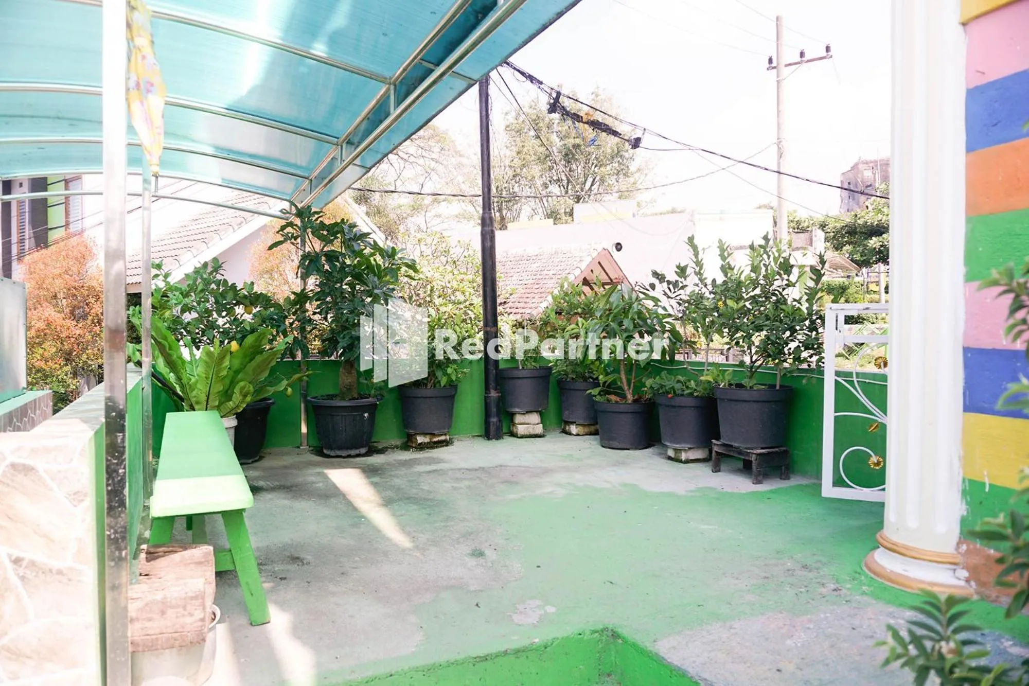 Balcony/Terrace in Griya Imafa Inn RedPartner near Jatim Park 2