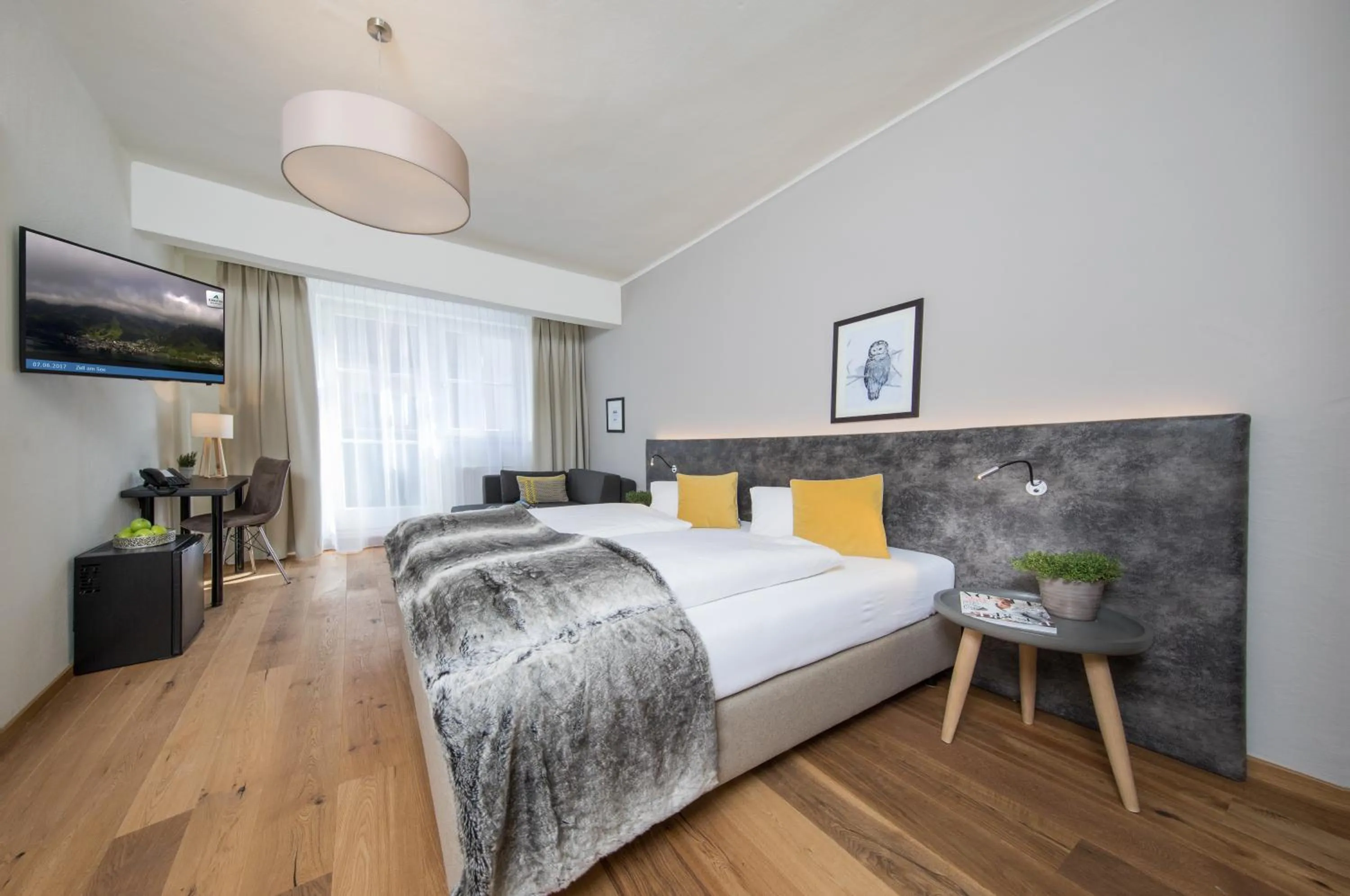 Photo of the whole room, Bed in HEITZMANN - Hotel & Rooftop