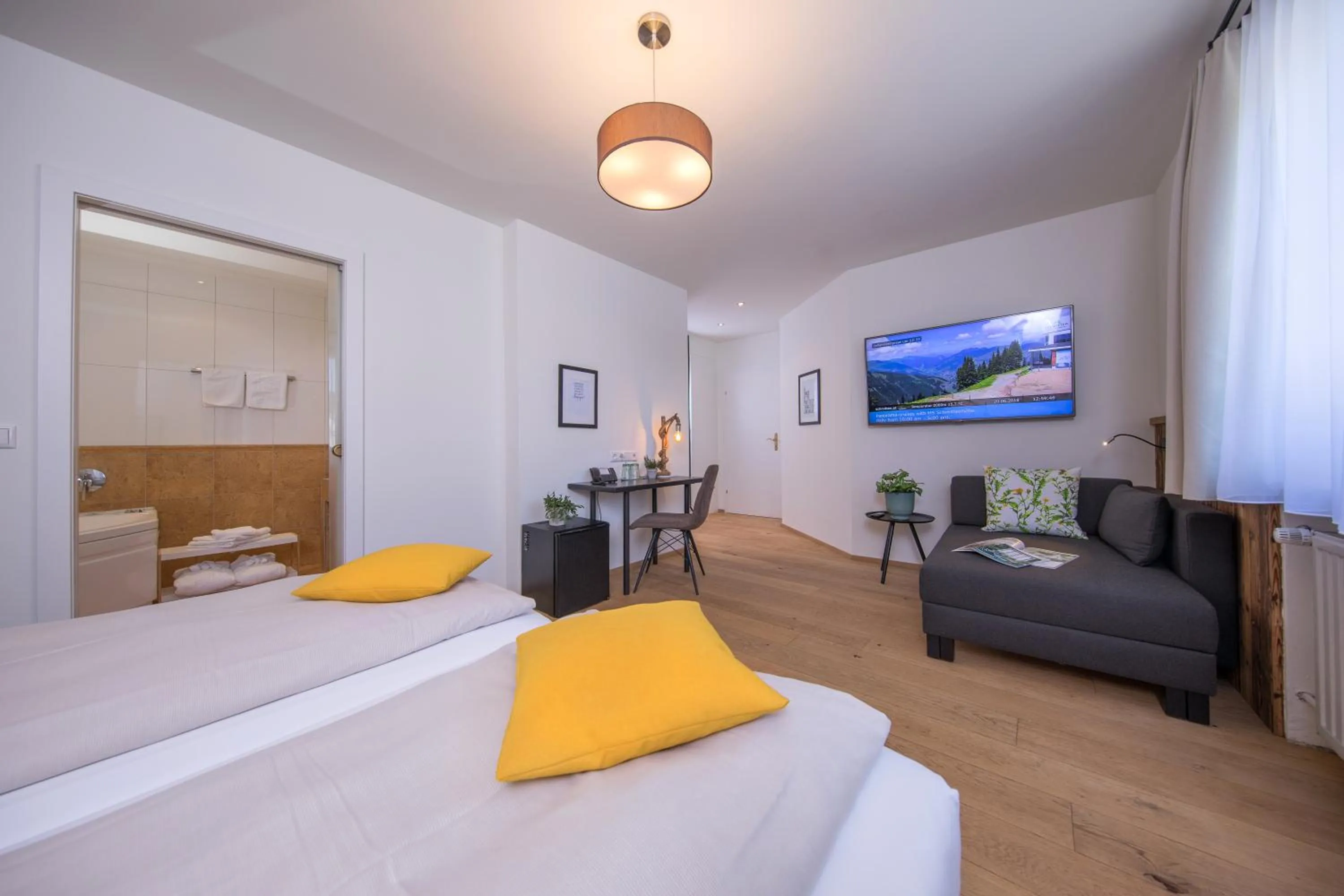 Bed in HEITZMANN - Hotel & Rooftop