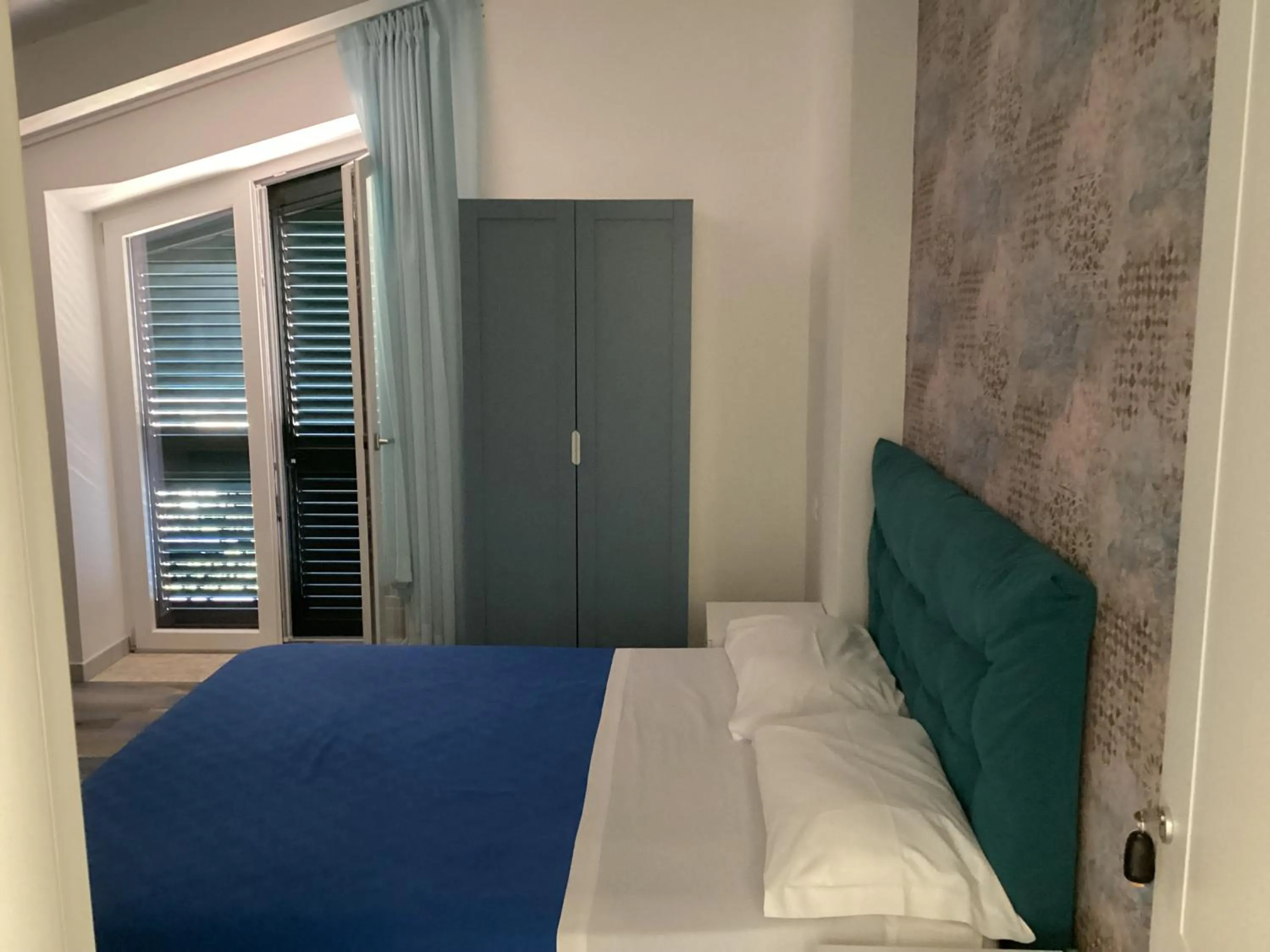 Bed in Villa Scotillo Boutique Hotel