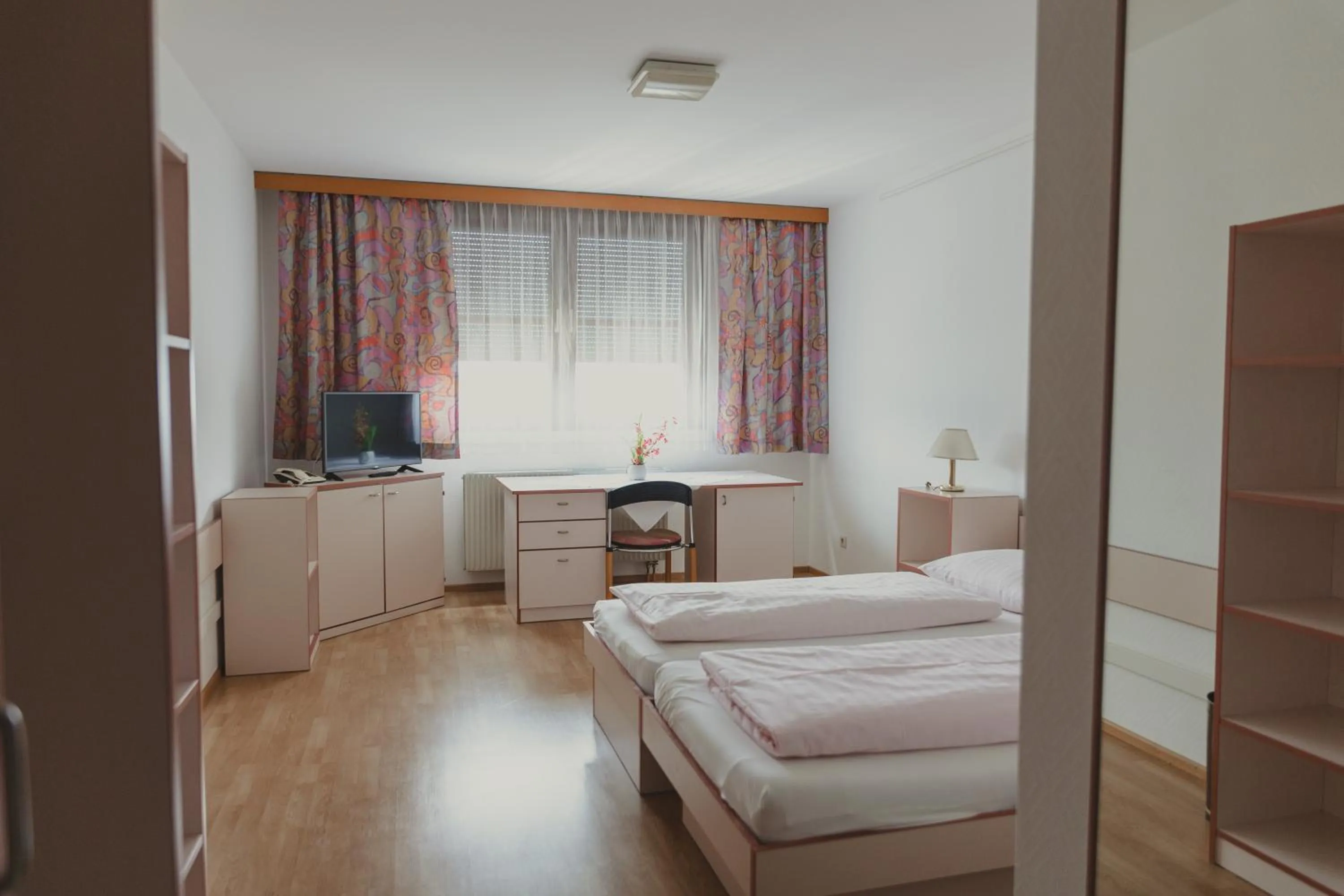 Photo of the whole room, Bed in Sommerhotel Karwendel