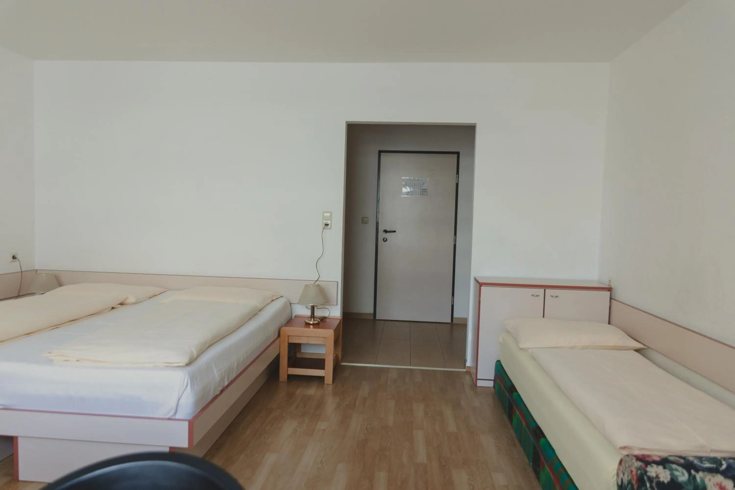 Photo of the whole room, Bed in Sommerhotel Karwendel