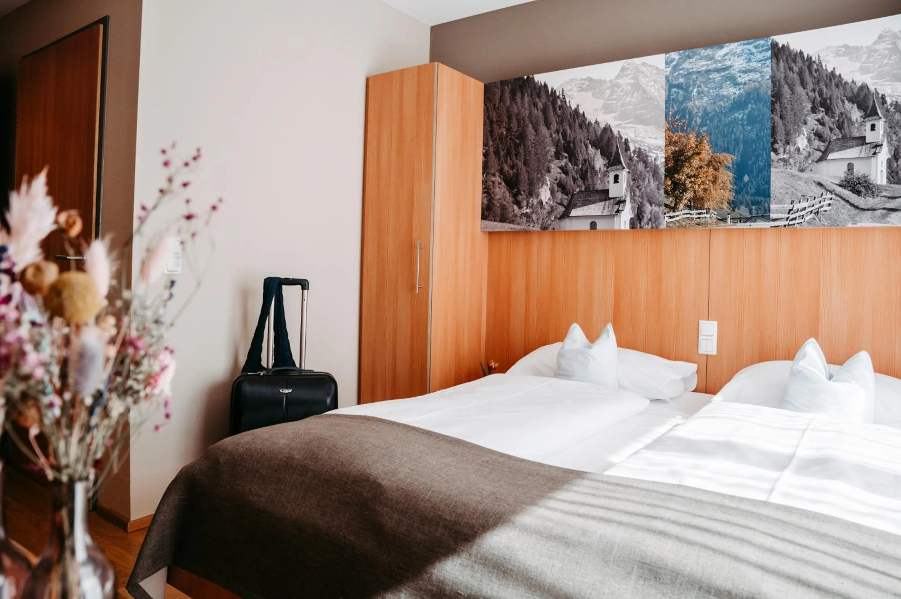 Photo of the whole room, Bed in JUFA Hotel Wipptal