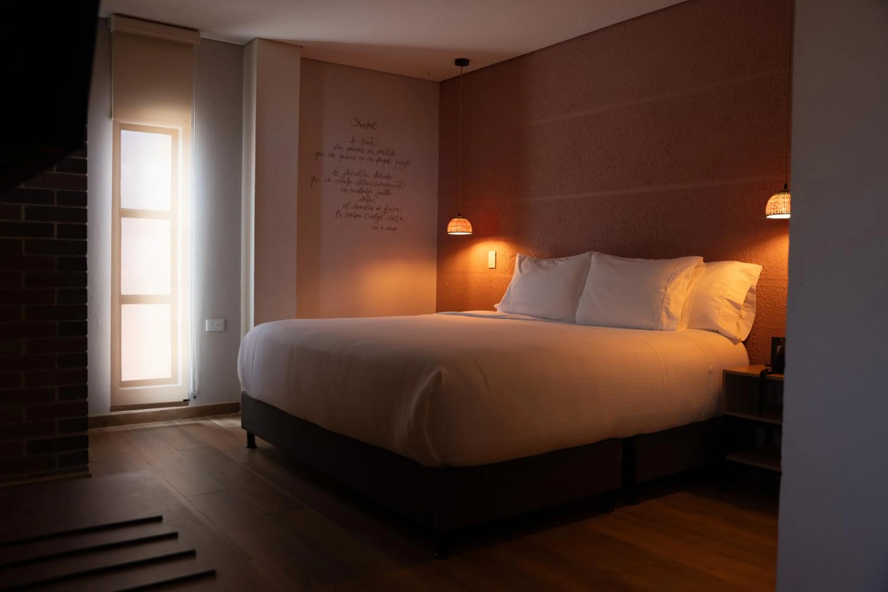 Bed in Casa Rose Hotel