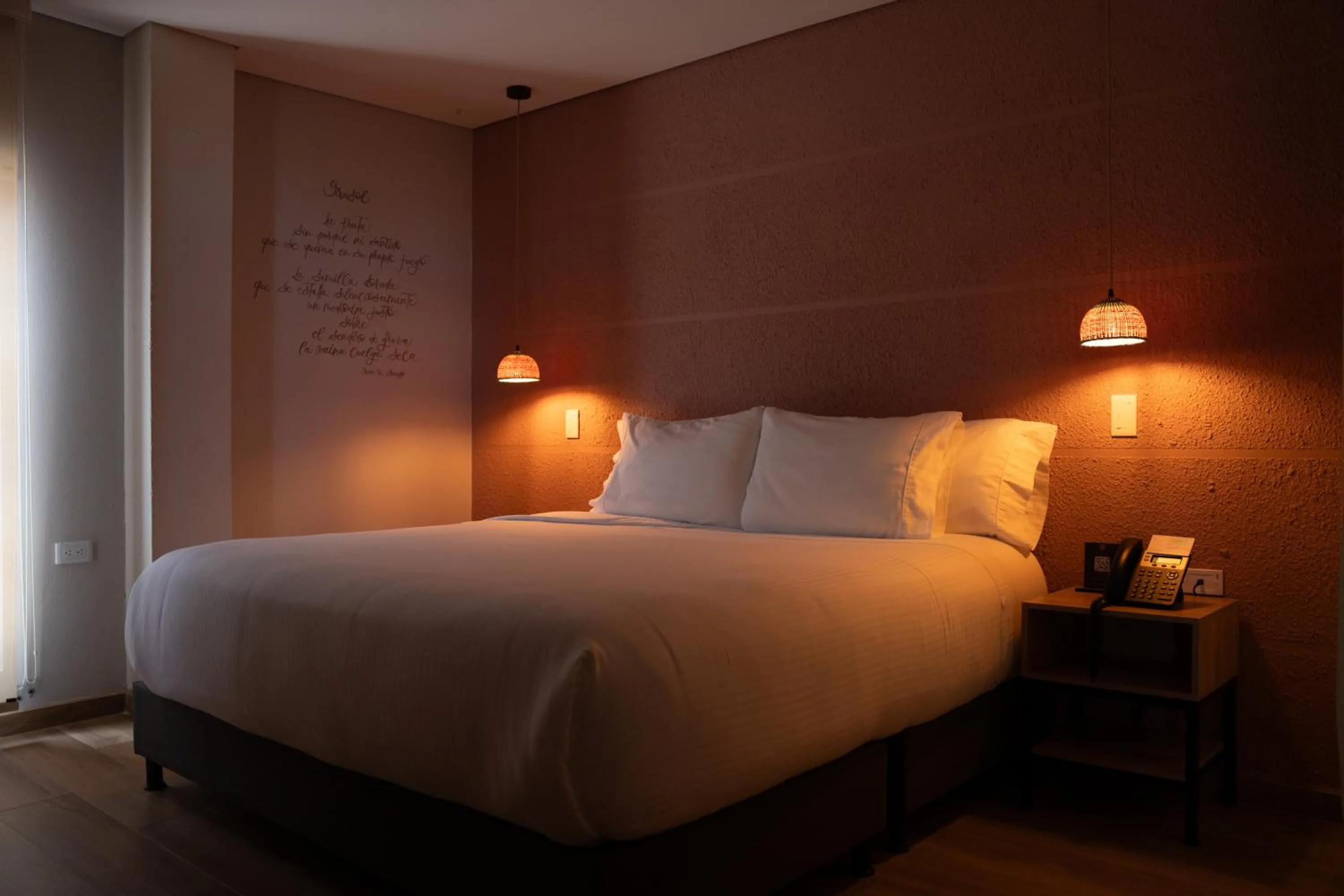 Bed in Casa Rose Hotel