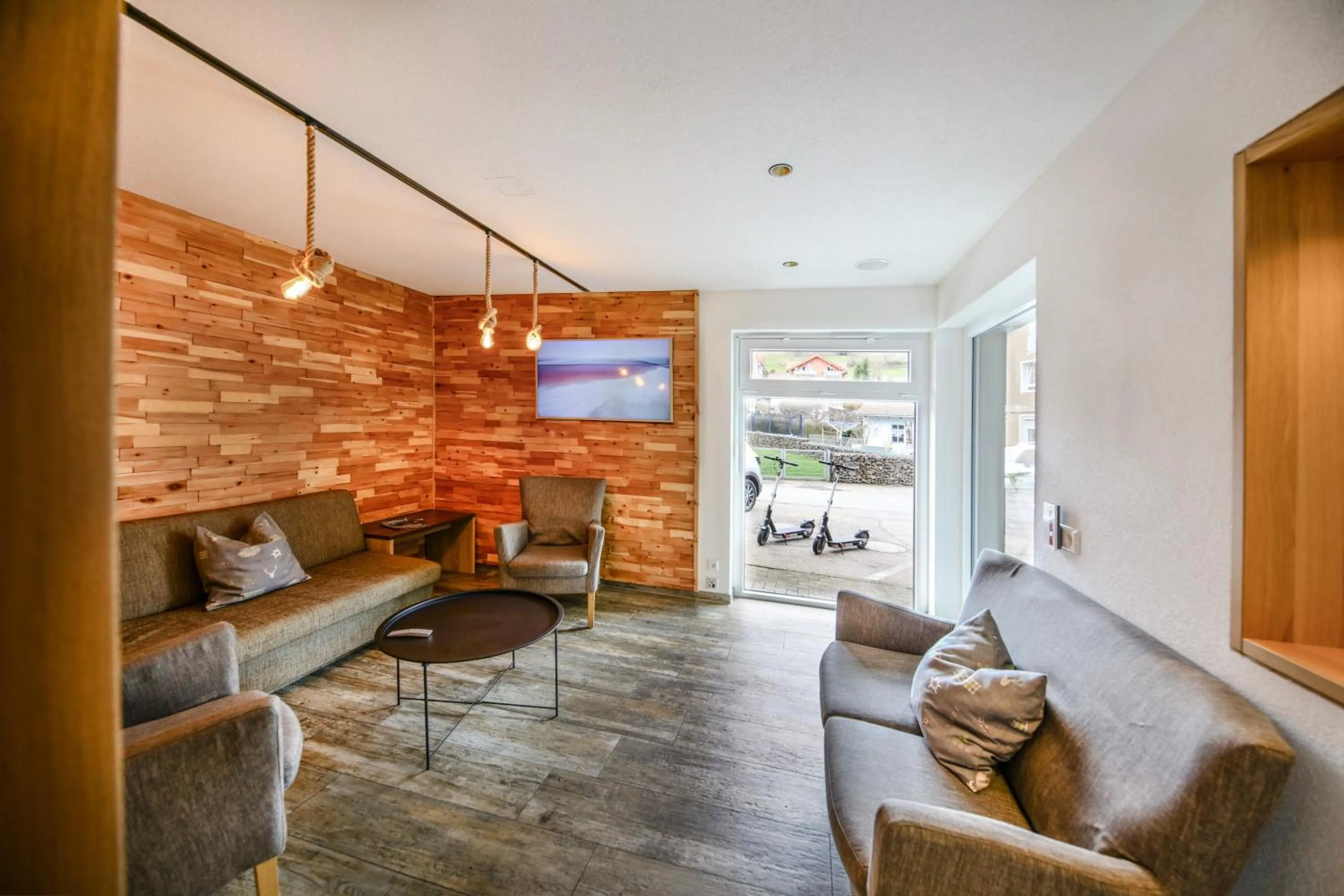 Communal lounge/ TV room in Hotel Restaurant Schwörer