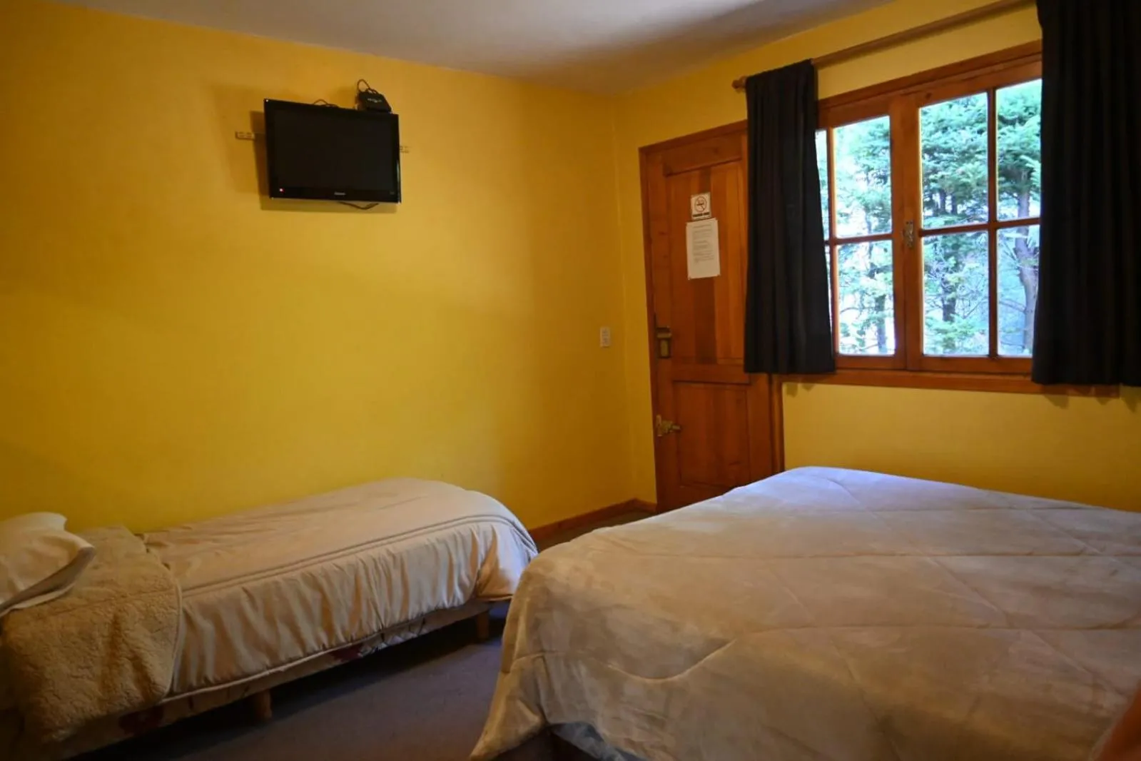 Bed in Posada de la Flor
