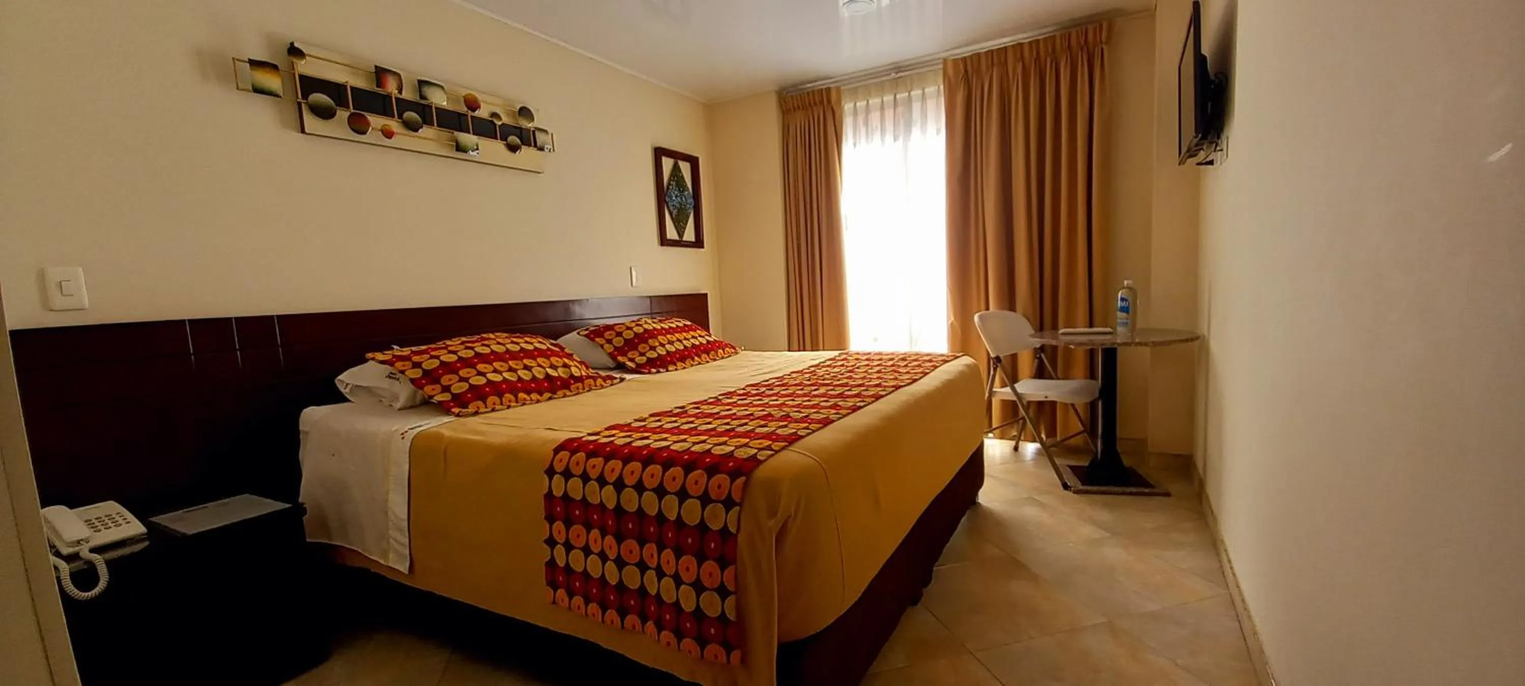 Photo of the whole room, Bed in Hoteles Bogotá Inn Lago Chico Zona Rosa
