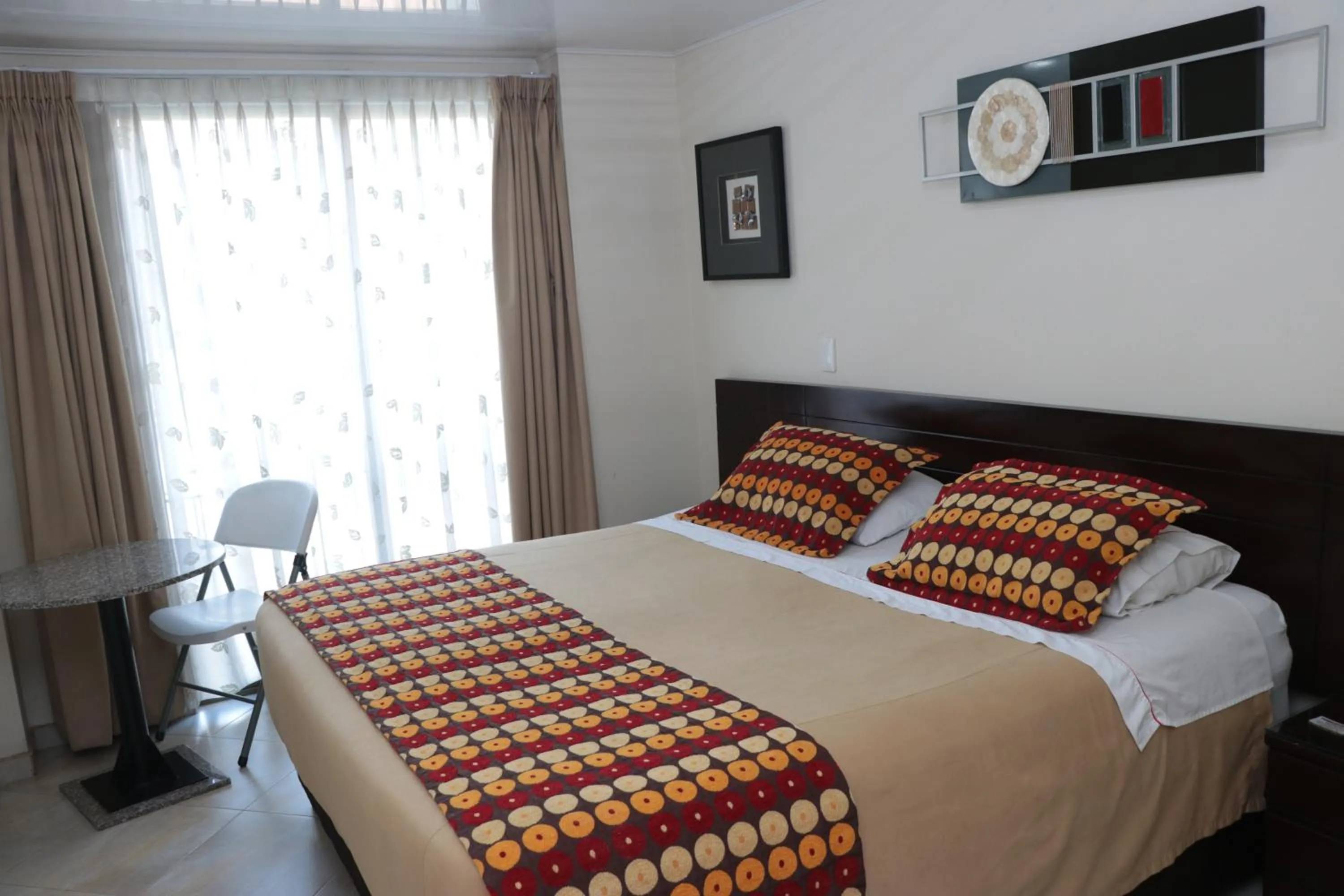 Photo of the whole room, Bed in Hoteles Bogotá Inn Lago Chico Zona Rosa