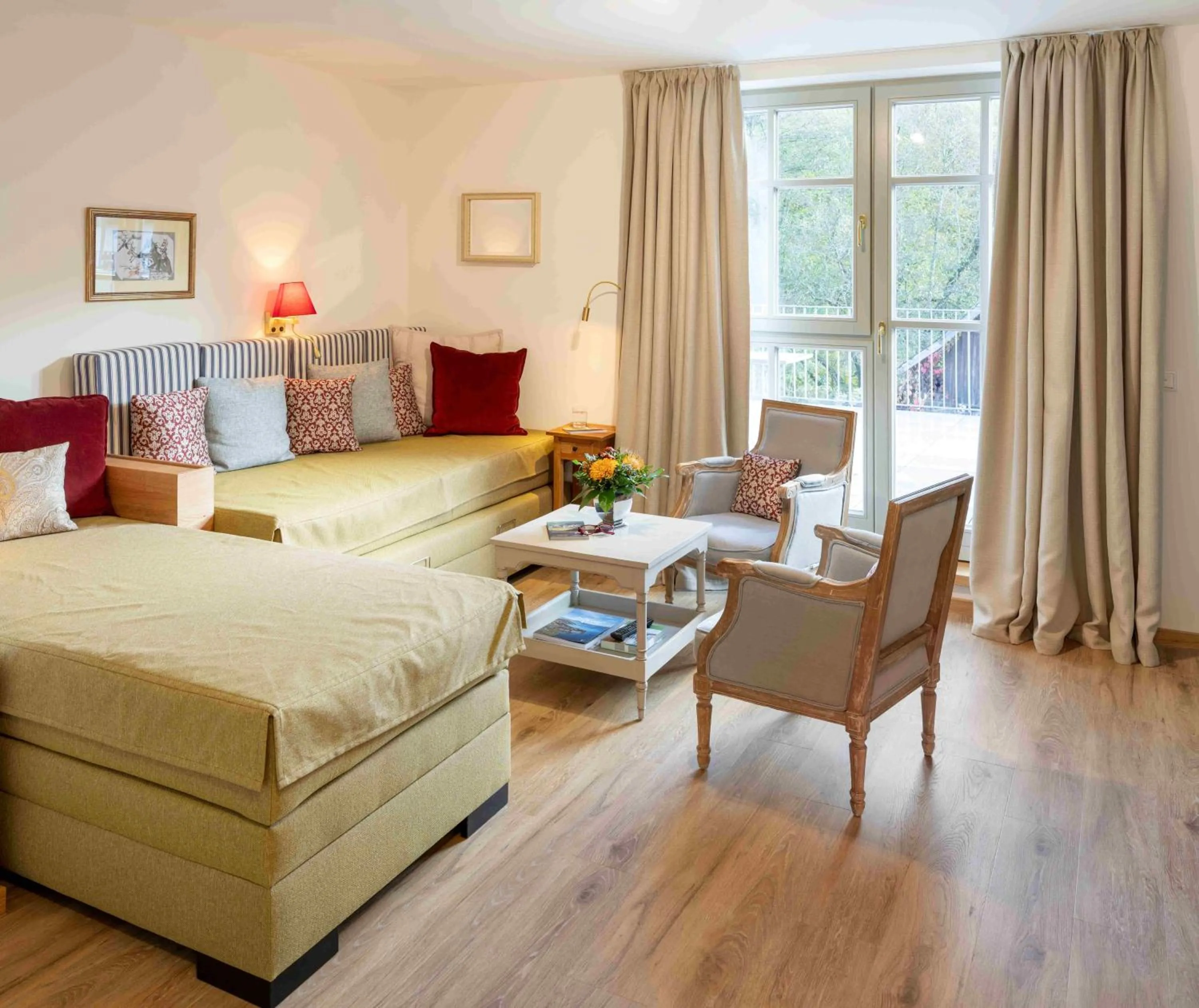 Living room, Bed in Romantik Hotel Landhaus Bärenmühle