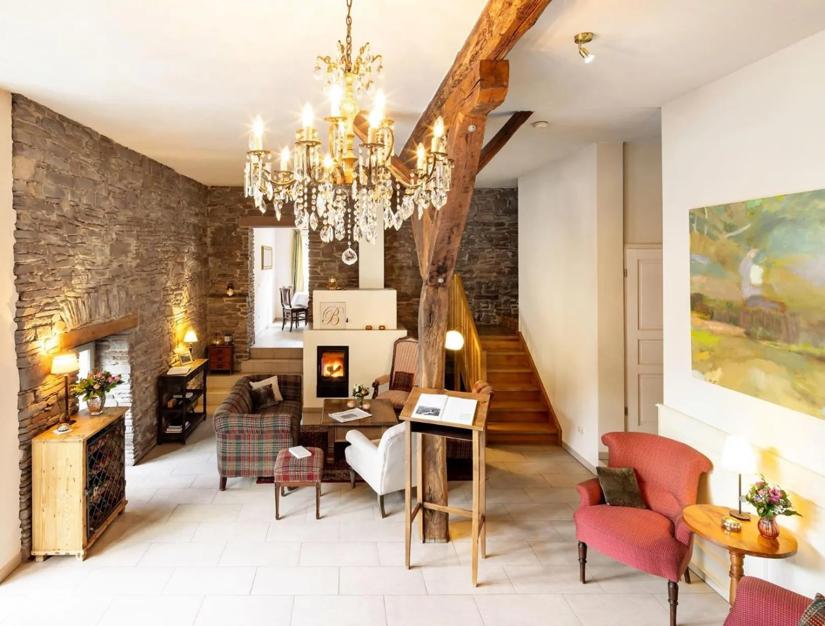 Communal lounge/ TV room in Romantik Hotel Landhaus Bärenmühle